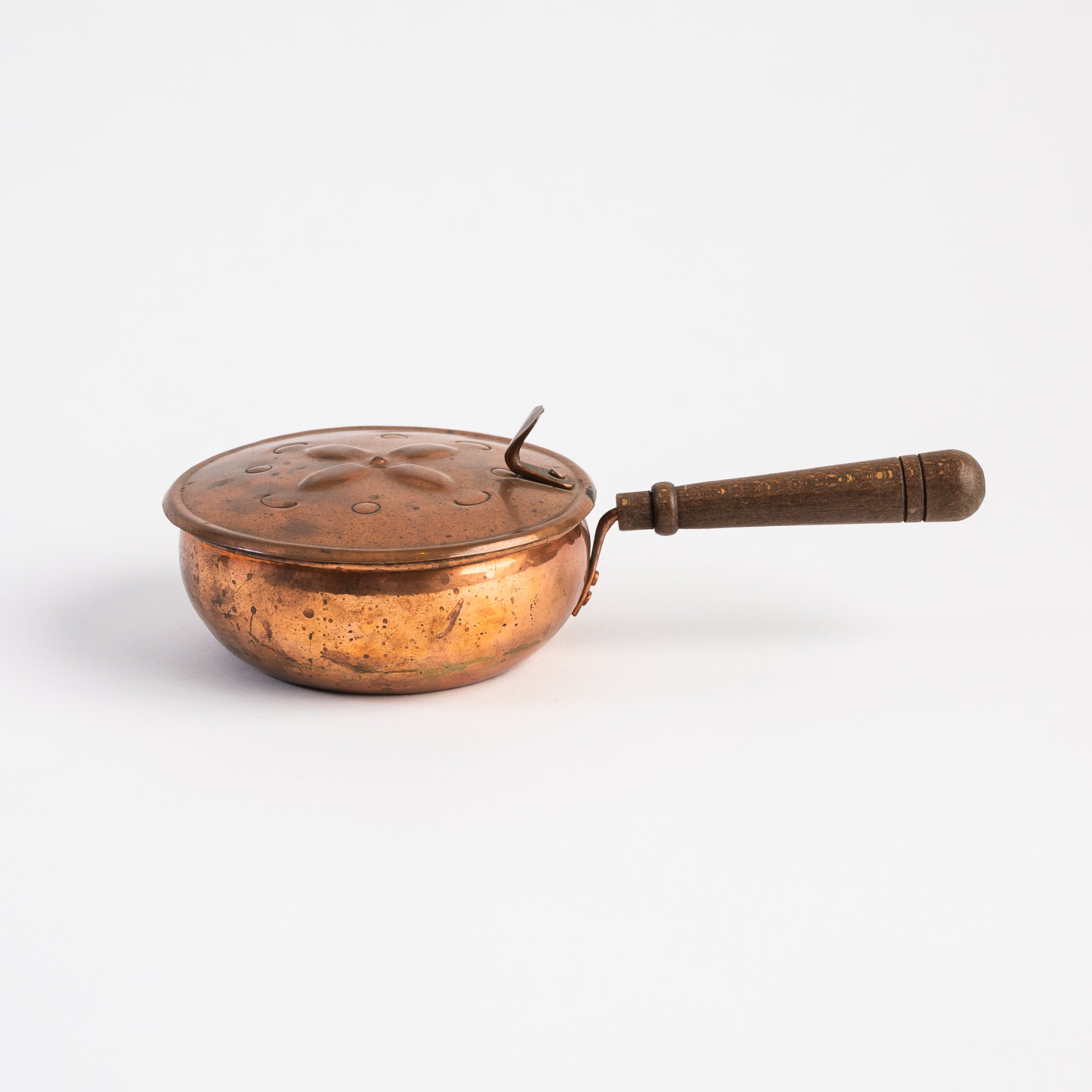 Vintage Copper Silent Butler on a white background at Addison West