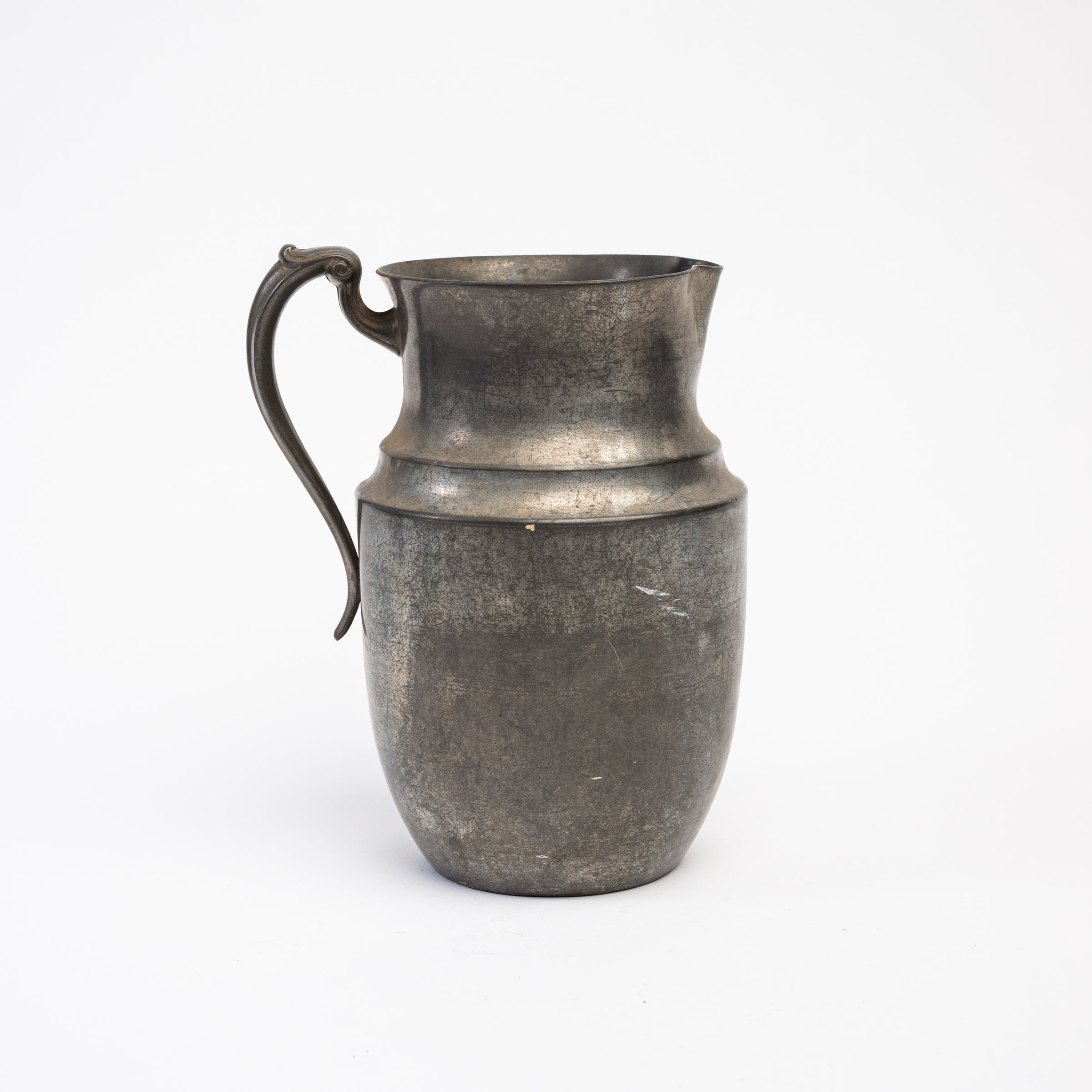 Vintage Pewter Pitcher on a white background at Addison West