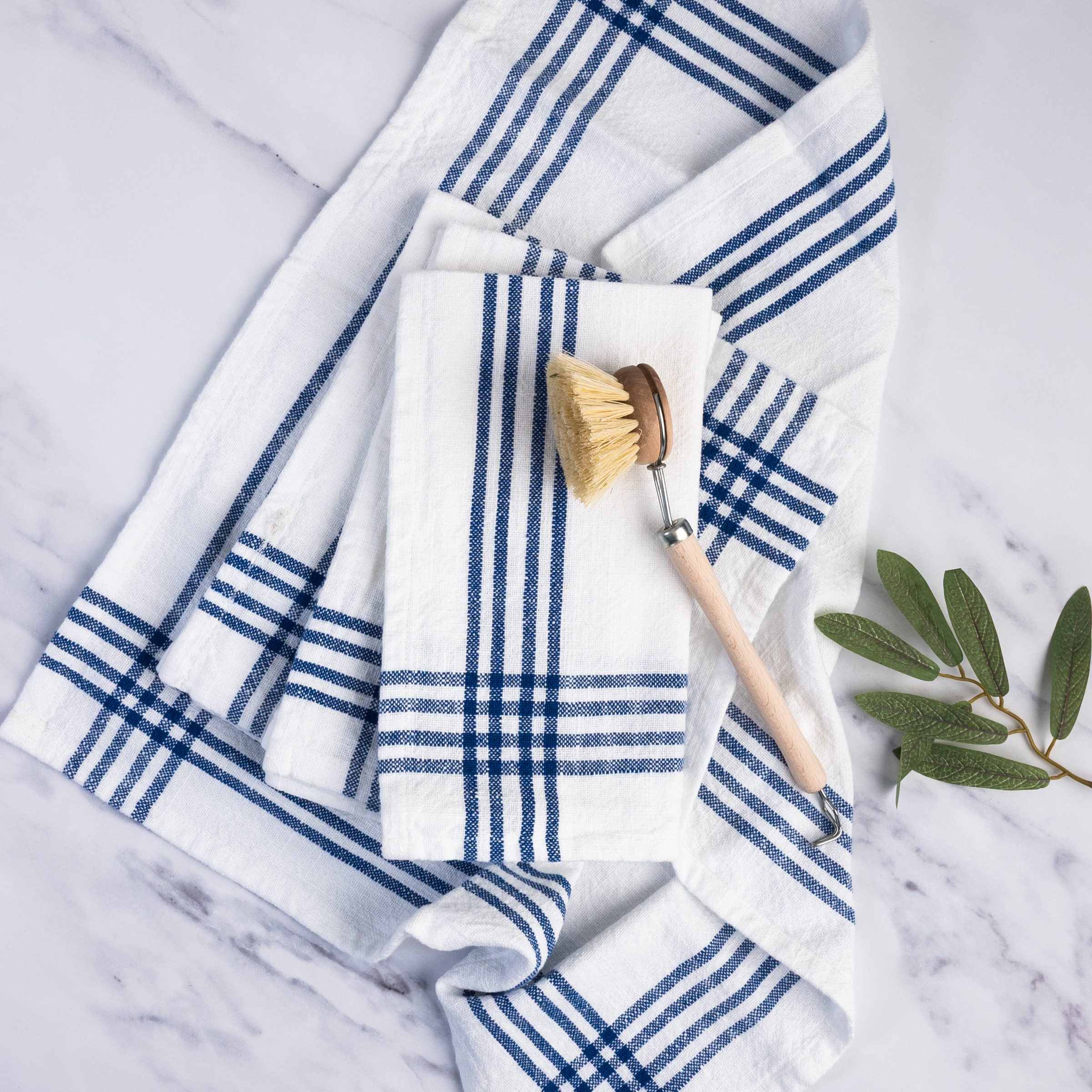 Farmhouse Napkin in Blue, Set of 4 on a kitchen counter at Addison West