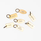 Brass keyrings at Addison West on a white background at Addison West
