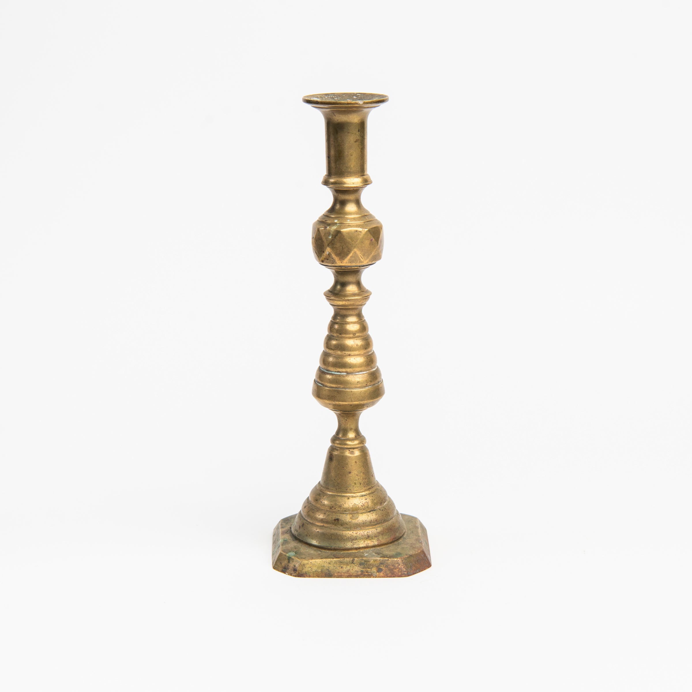 Vintage Brass Geometric Candlesticks on a white background at Addison West