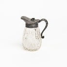 Vintage Victorian Ornate Syrup Pitcher on a white background at Addison West