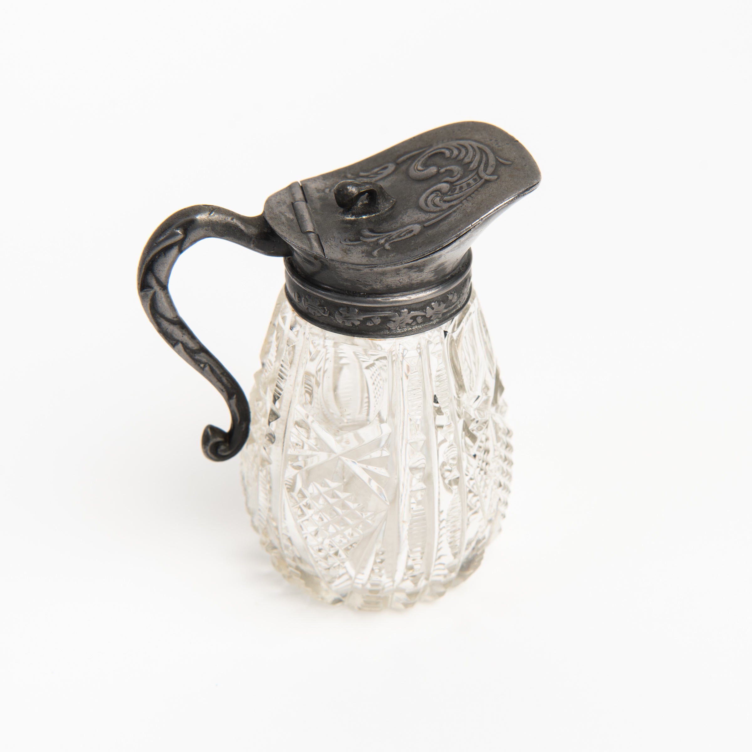 Vintage Victorian Ornate Syrup Pitcher on a white background at Addison West