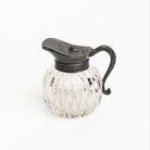 Vintage Round Victorian Syrup Pitcher on a white background at Addison West