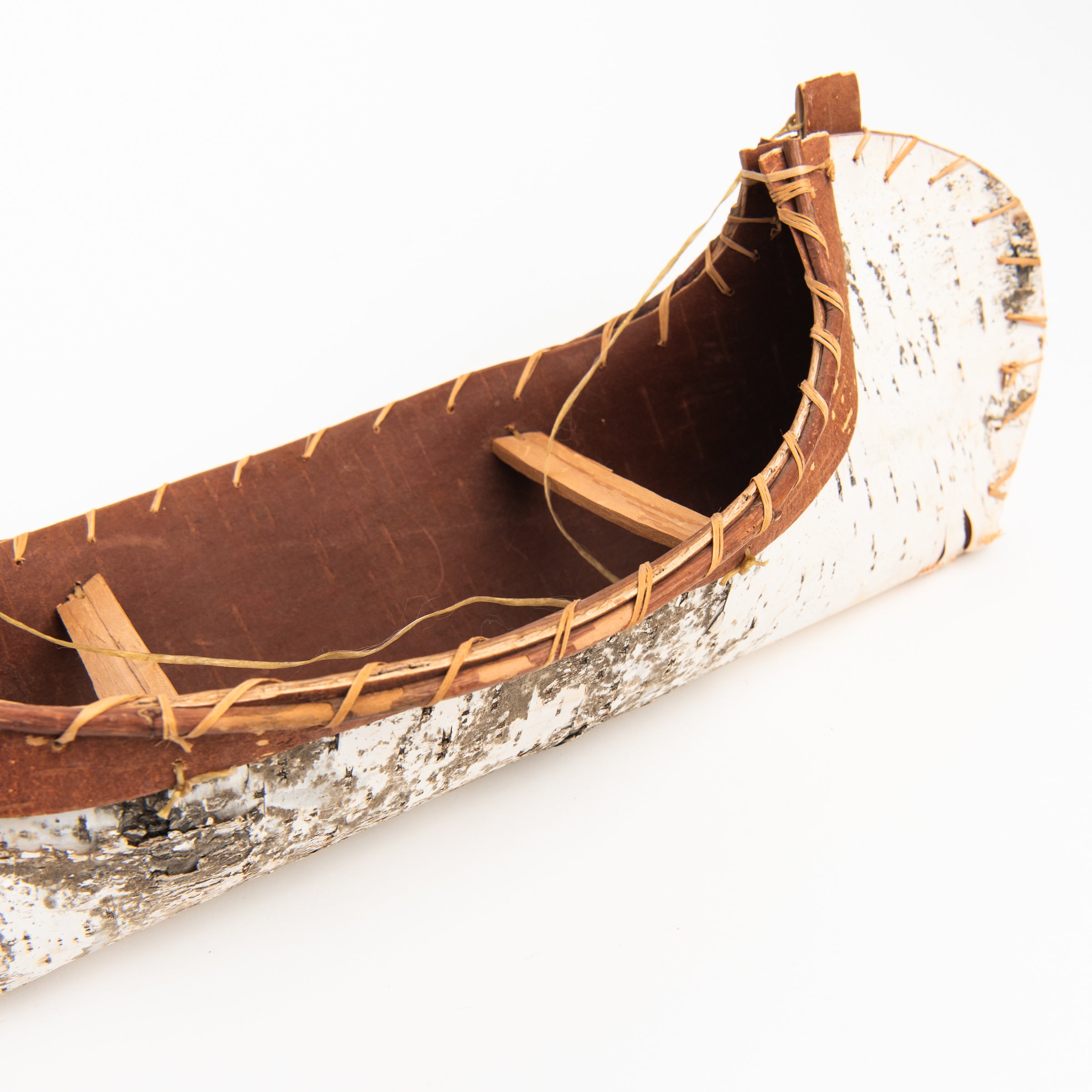 Vintage Birchbark Canoe on a white background at Addison West