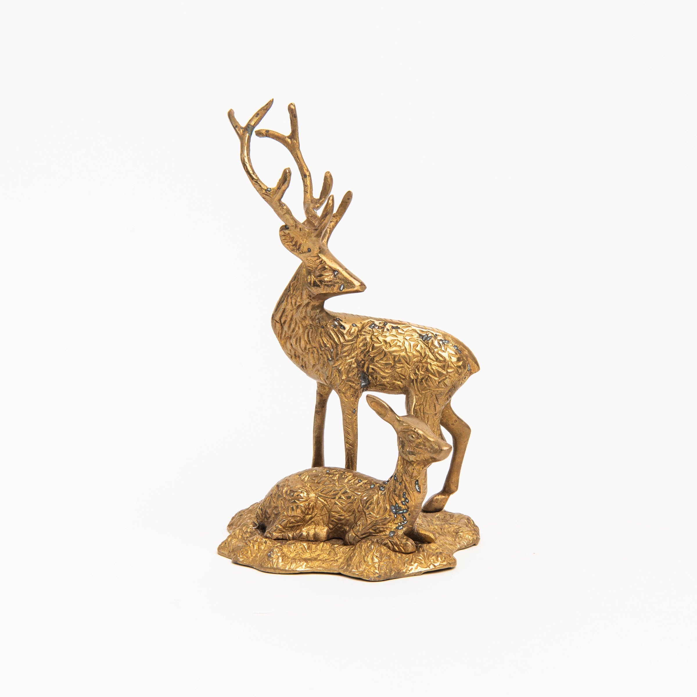 Vintage Patinaed Brass Buck and Doe on a white background at Addison West