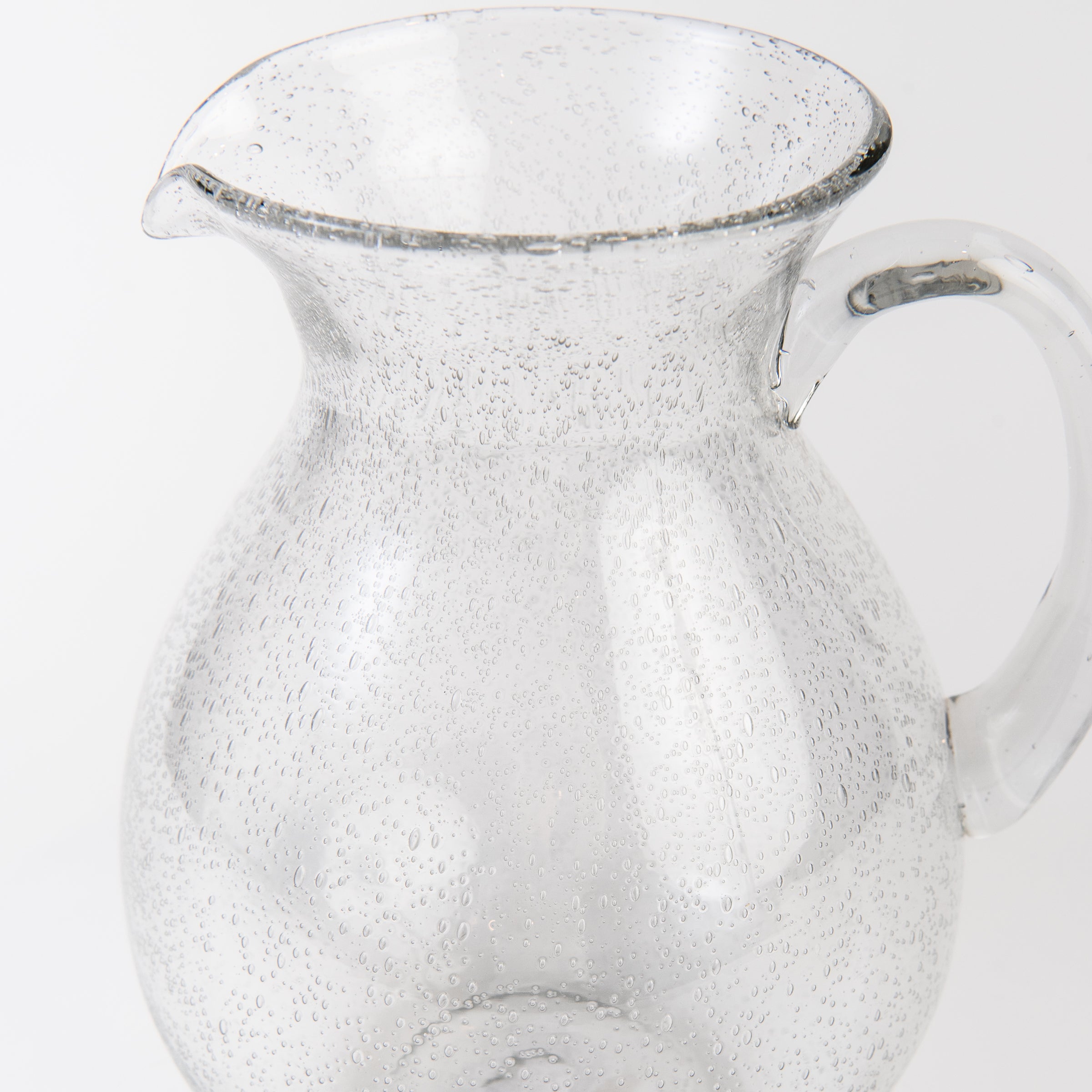 Close up of Bubble Glass Pitcher on a white background at Addison West