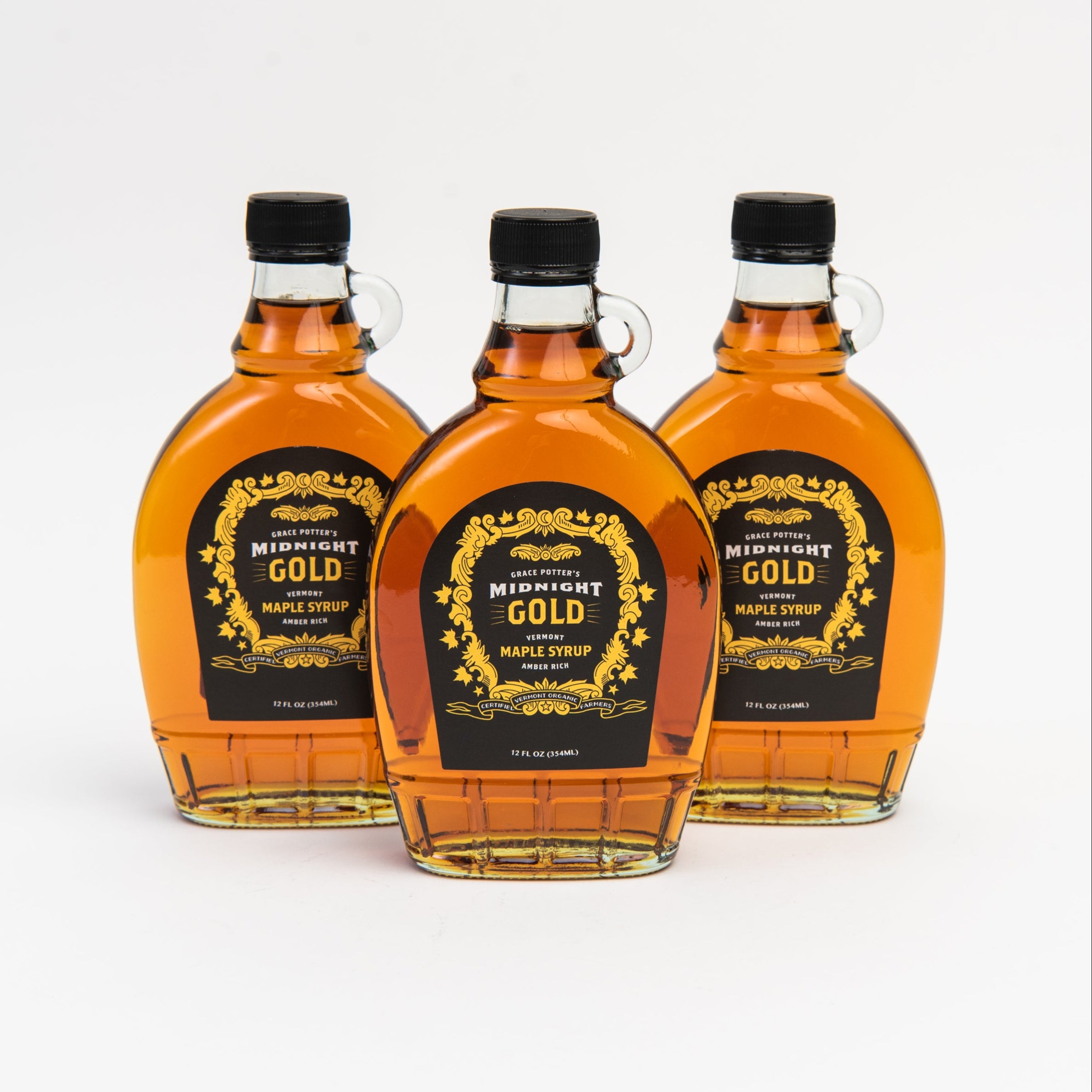 Grace Potter's Midnight Gold Maple Syrup on a white background at Addison West