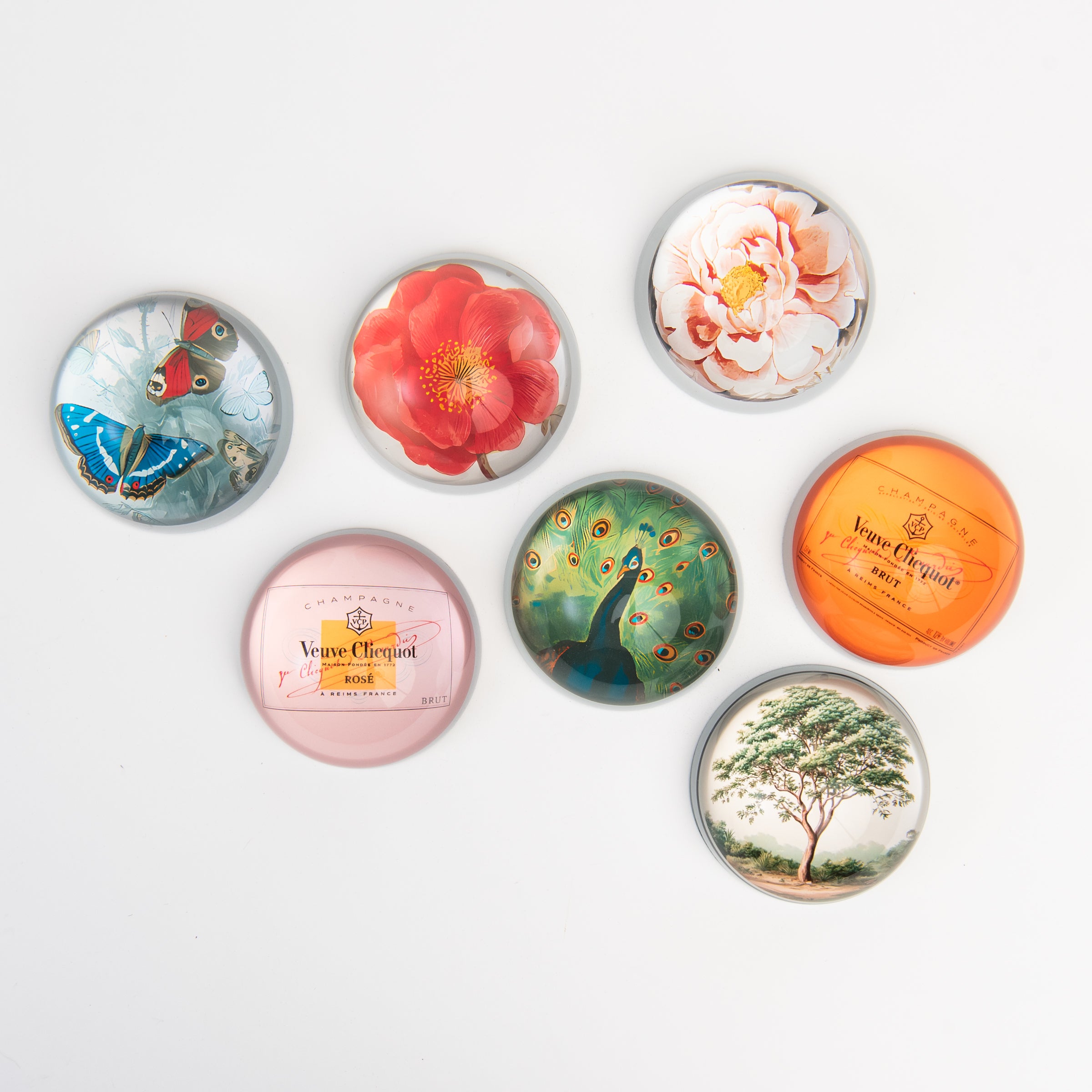 Collection of Saint Austin Company paperweights on a white background at Addison West