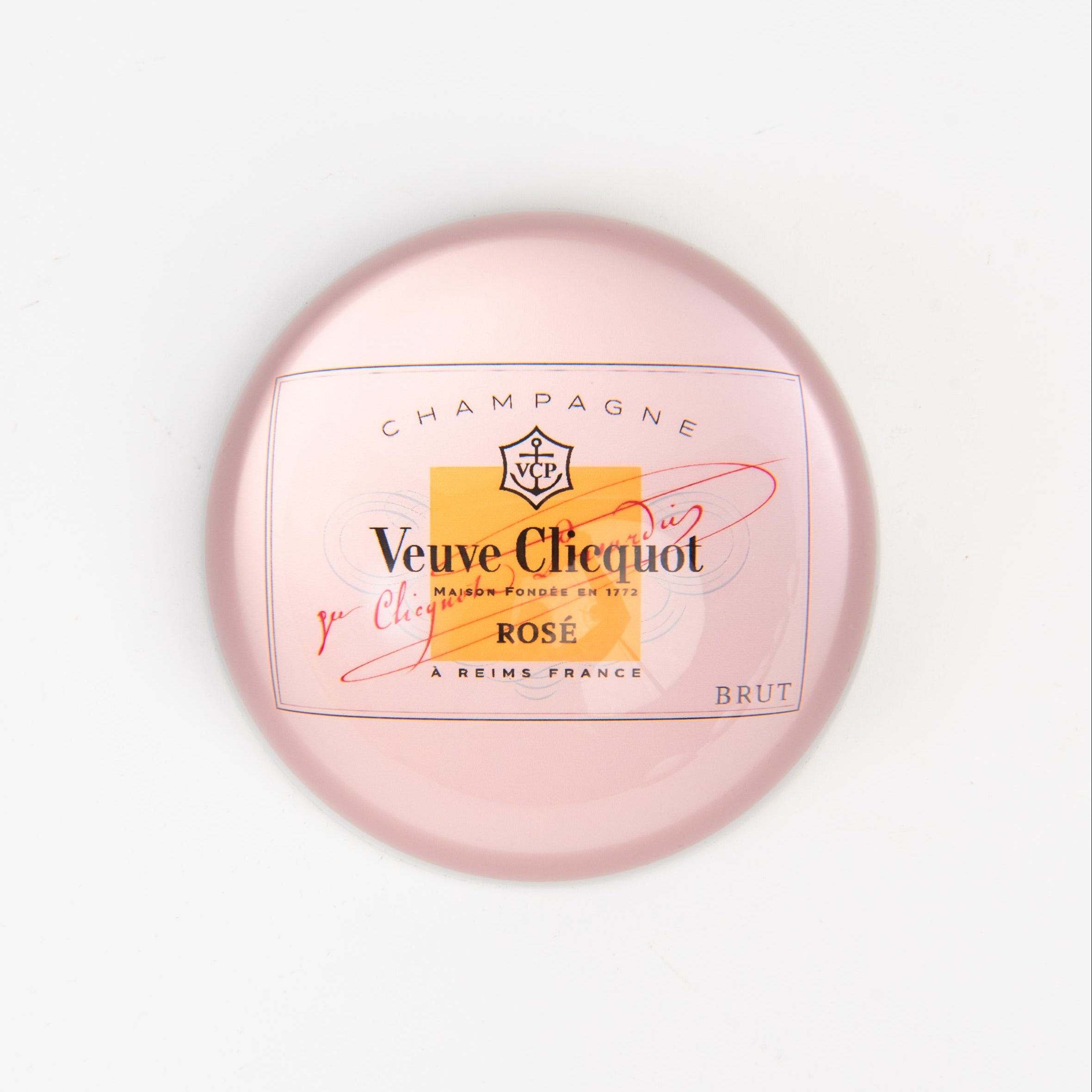 Pink Champagne Paperweight on a white background at Addison West