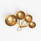 Cultivar Measuring Cups in Tumbled Gold on a white background at Addison West