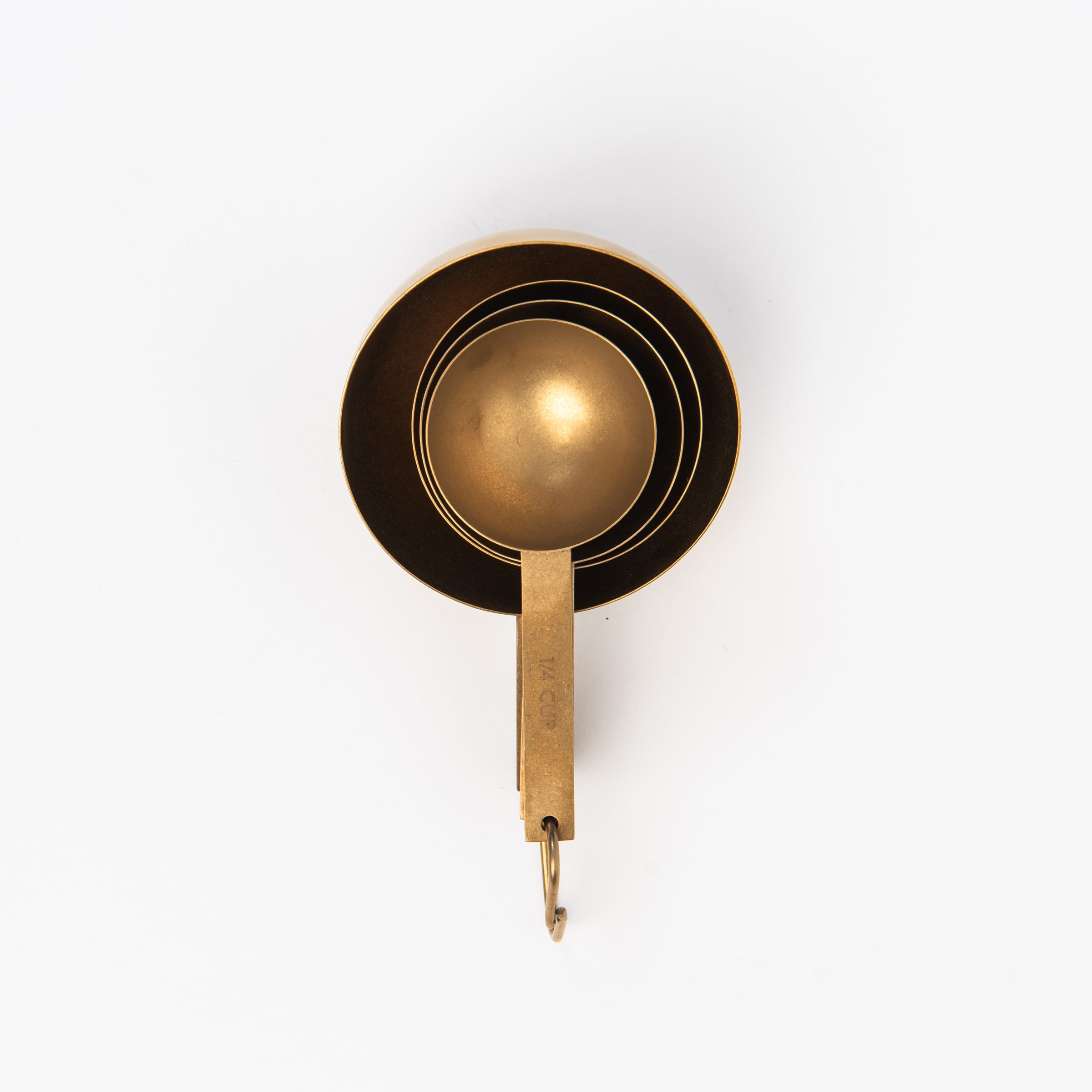 Cultivar Measuring Cups in Tumbled Gold on a white background at Addison West