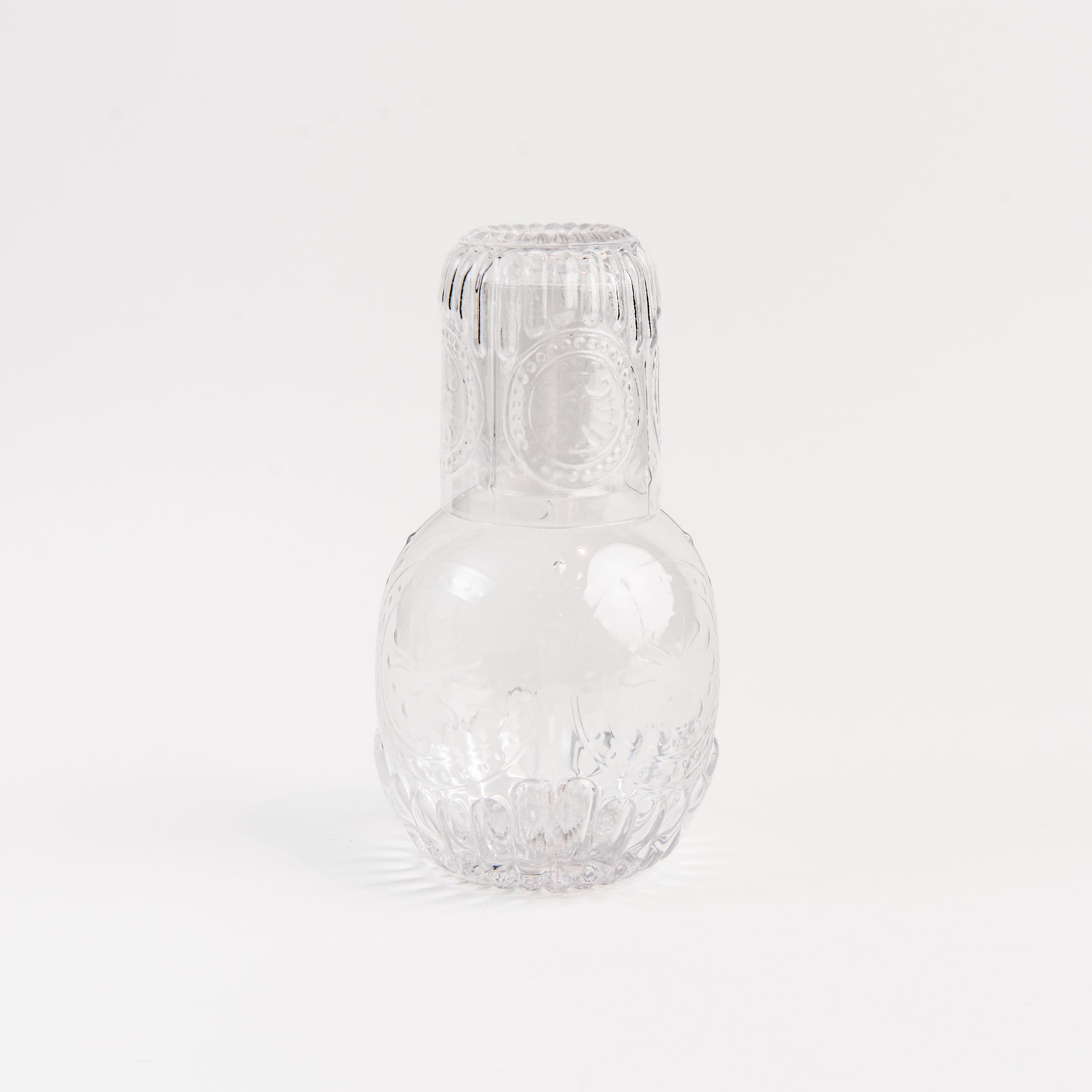 Emily Embossed Glass Carafe and Cup Set on a white background at Addison West
