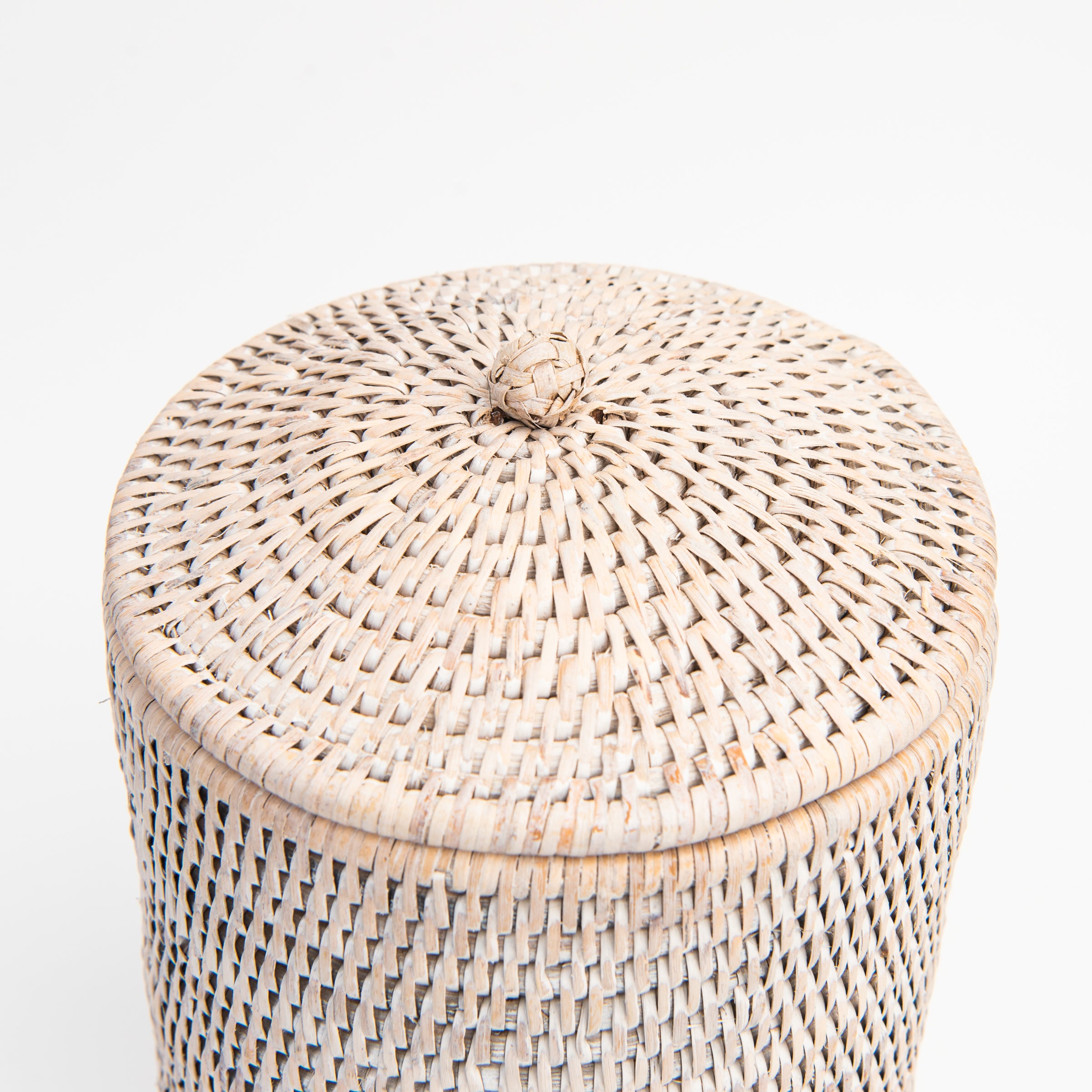 Close up of Rattan Toilet Paper Holder in White Wash on a white background at Addison West