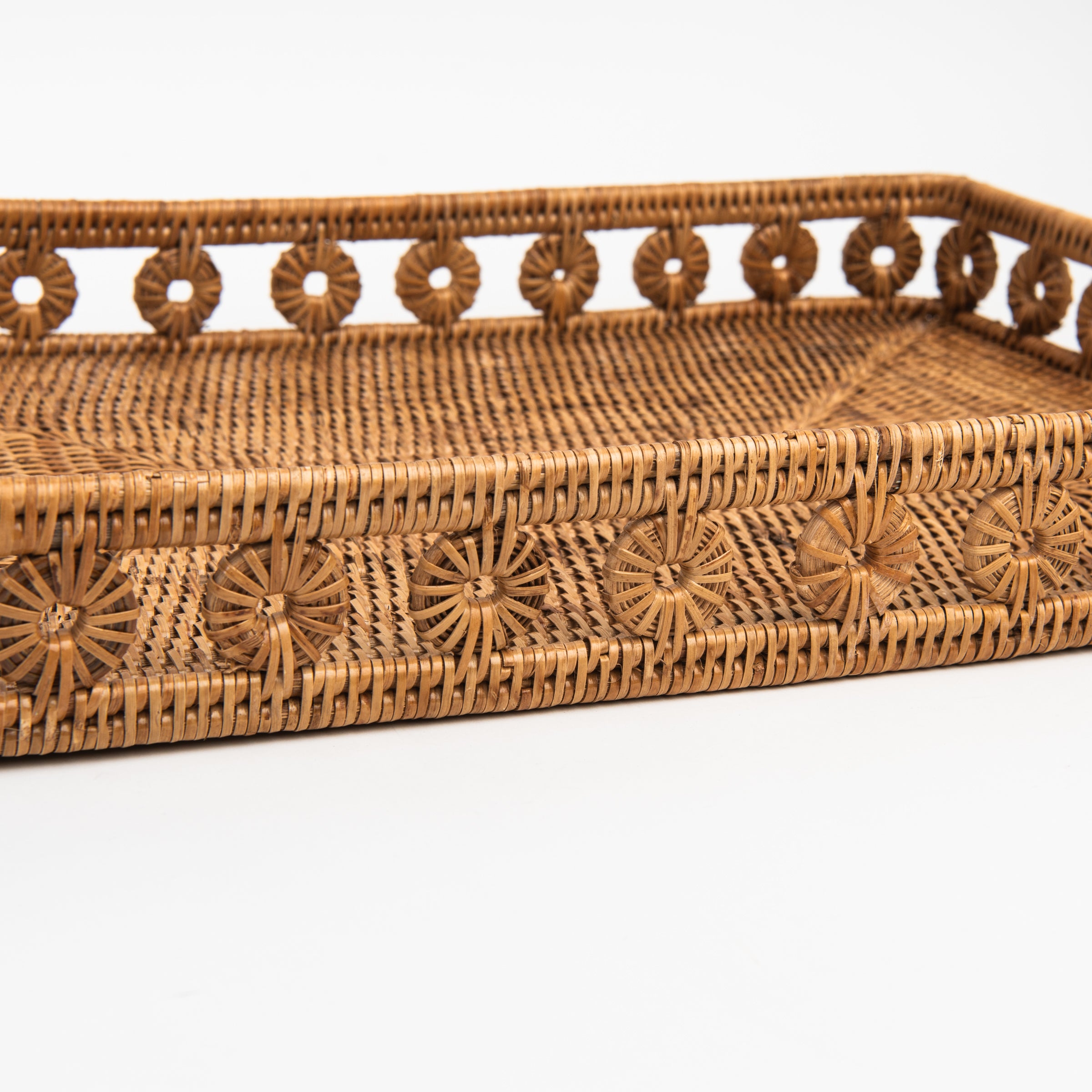 Close up of Ingrid Rattan Rectangular Tray on a white background at Addison West