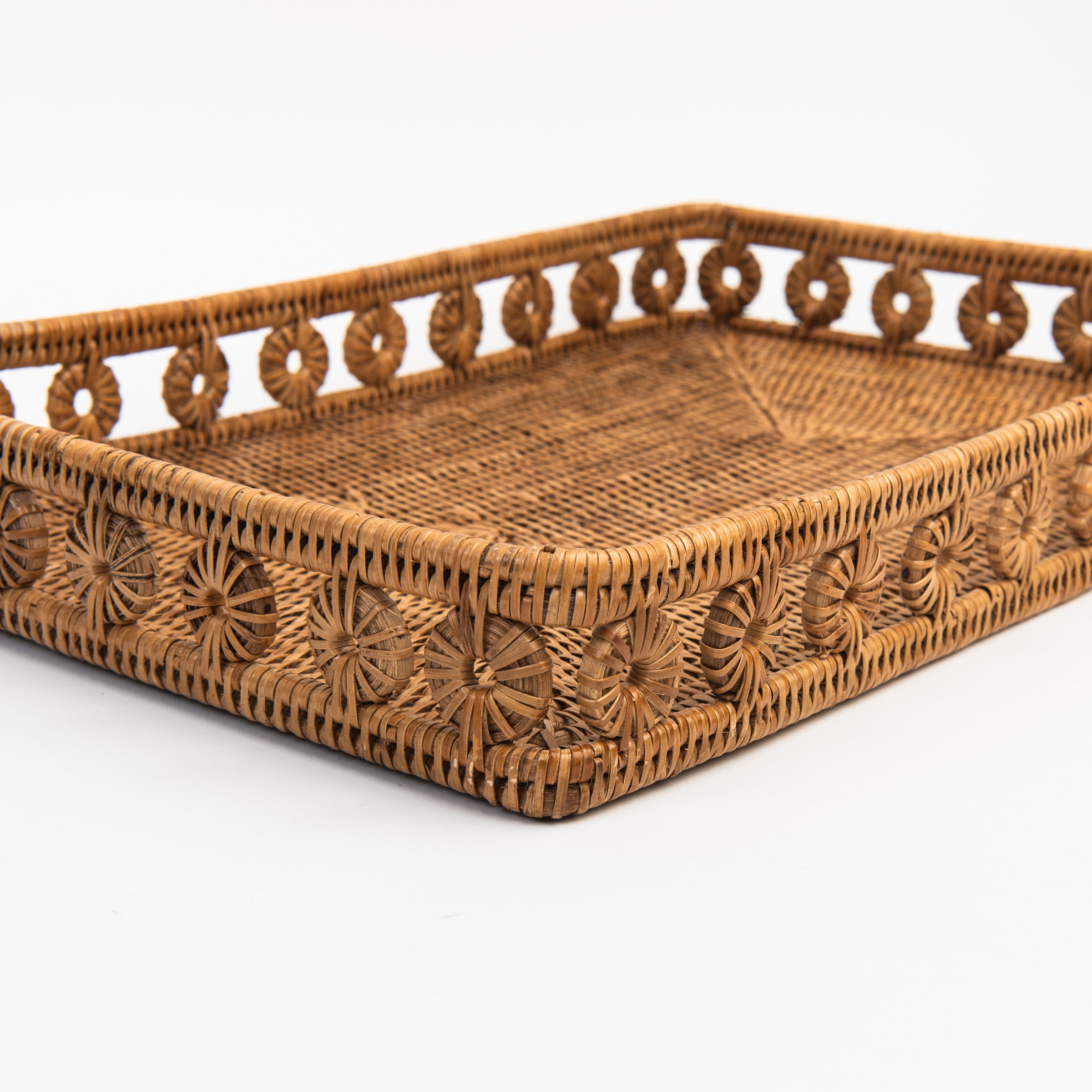 Close up of Ingrid Rattan Rectangular Tray on a white background at Addison West