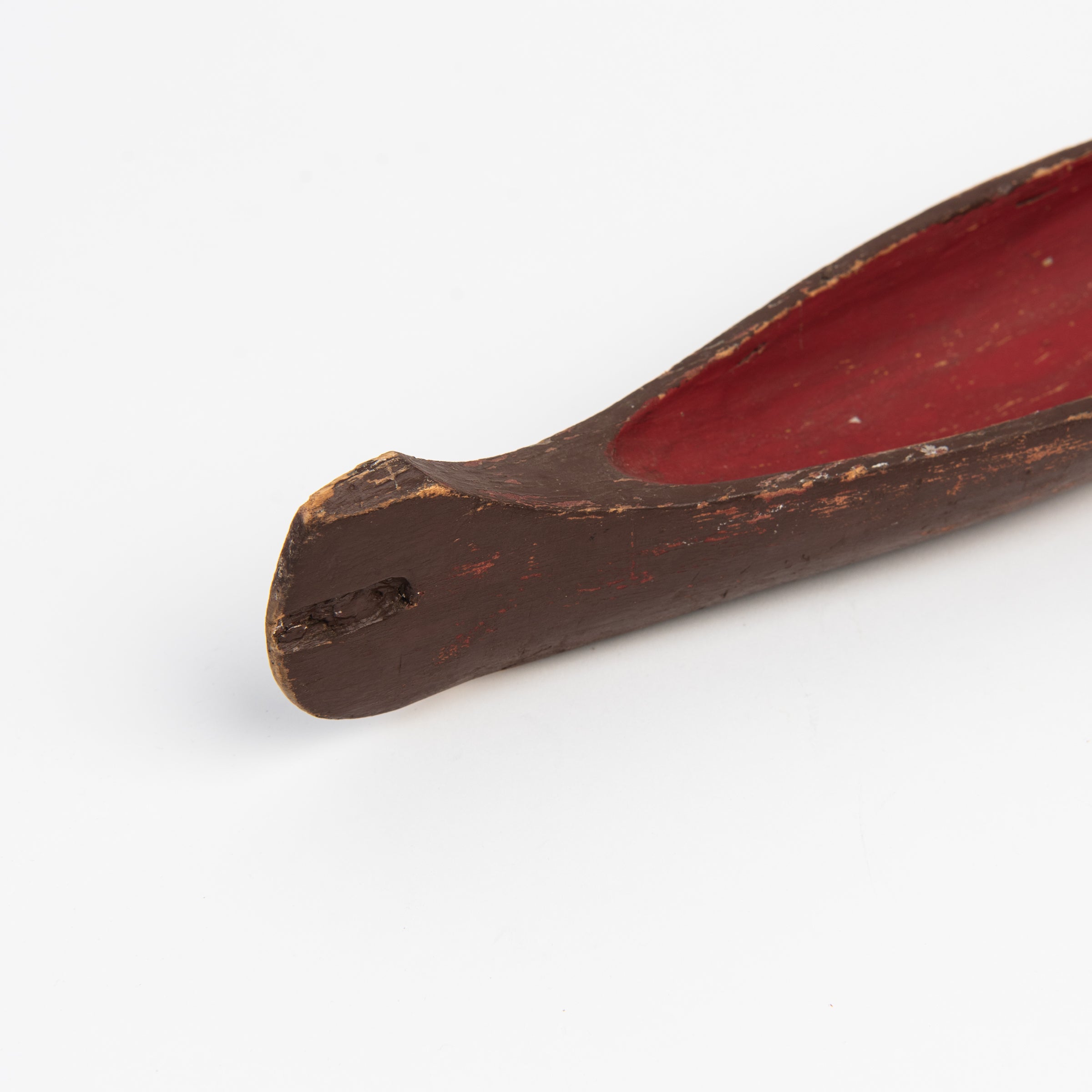 Close up of Vintage Painted Canoe on a white background at Addison West