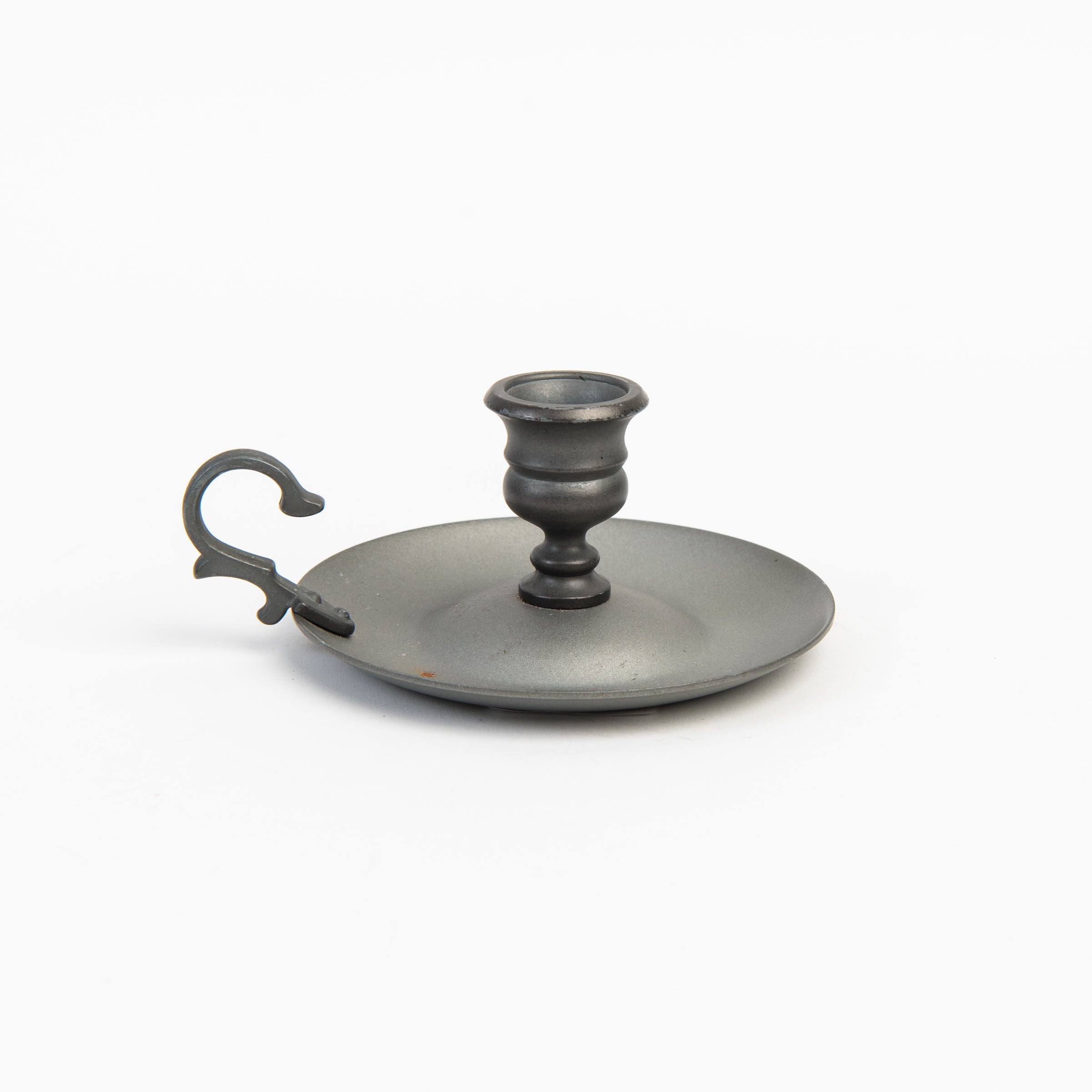Vintage Pewter Candlestick on a white background at Addison West