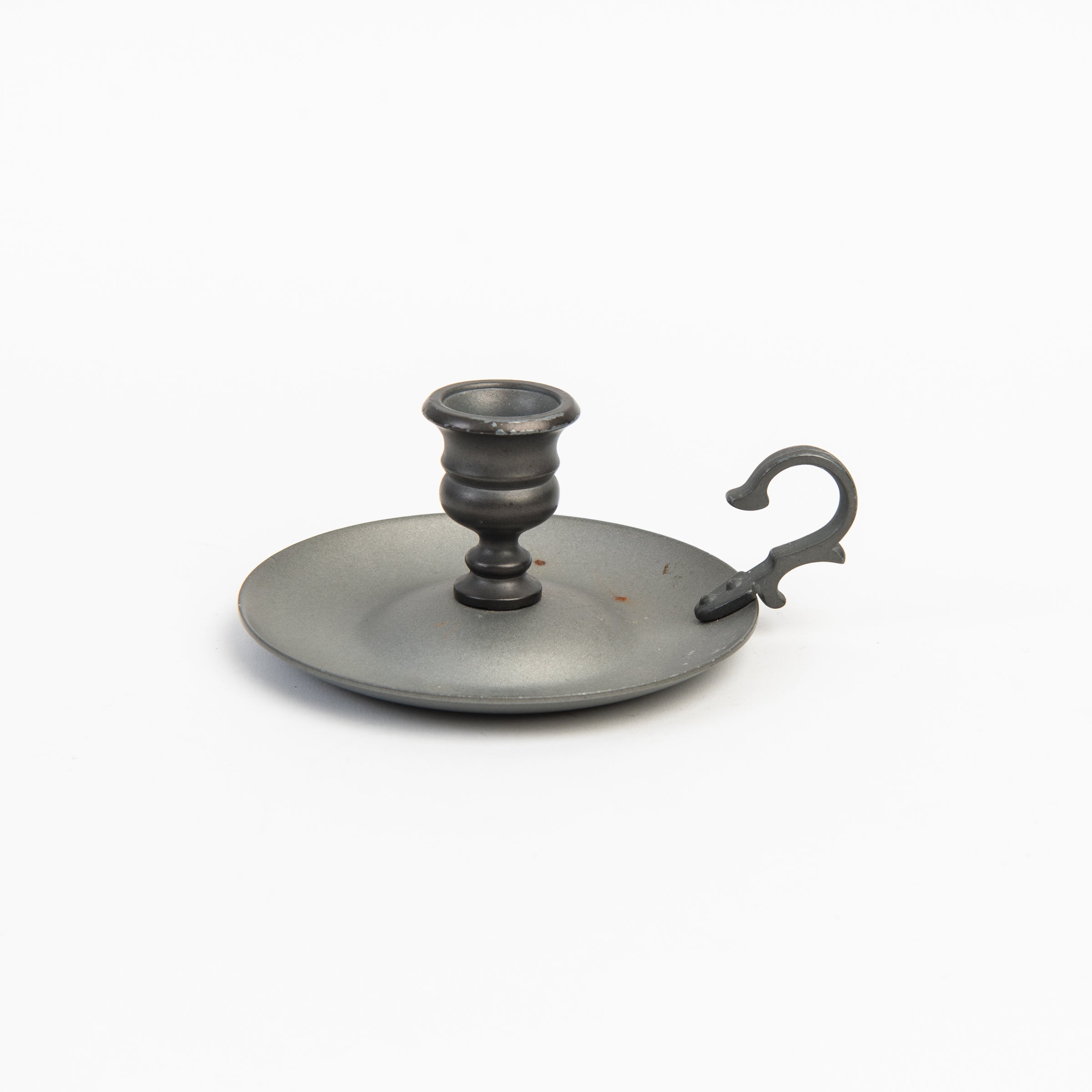 Vintage Pewter Candlestick on a white background at Addison West