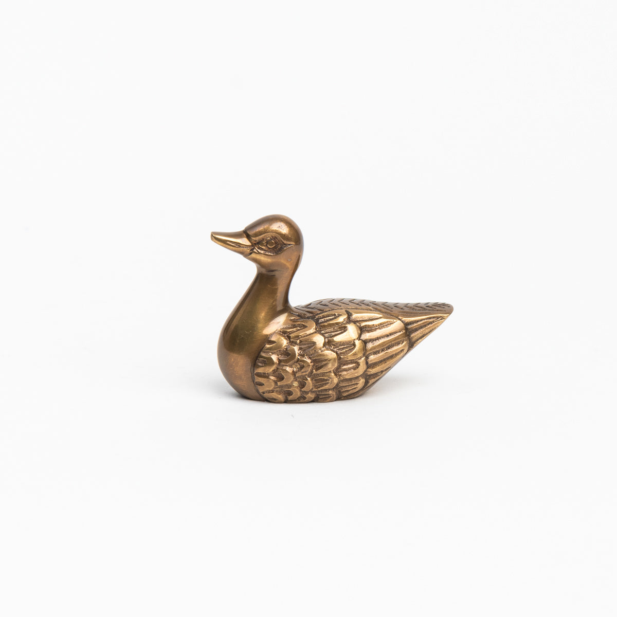 Antiqued Solid Brass Duck on a white background at Addison West