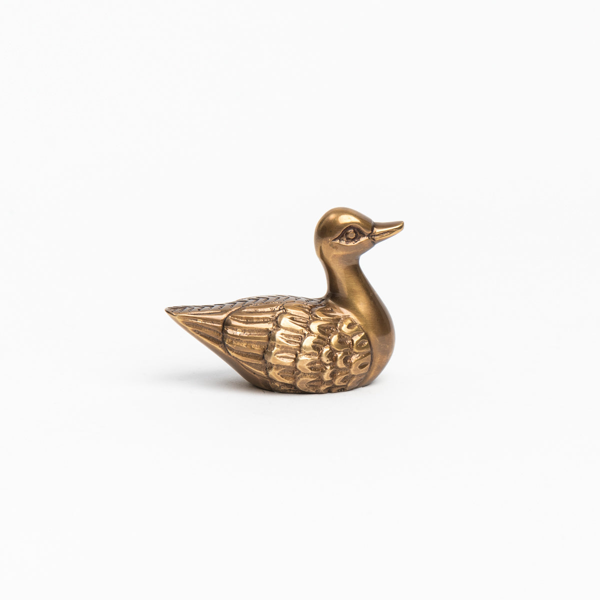 Antiqued Solid Brass Duck on a white background at Addison West