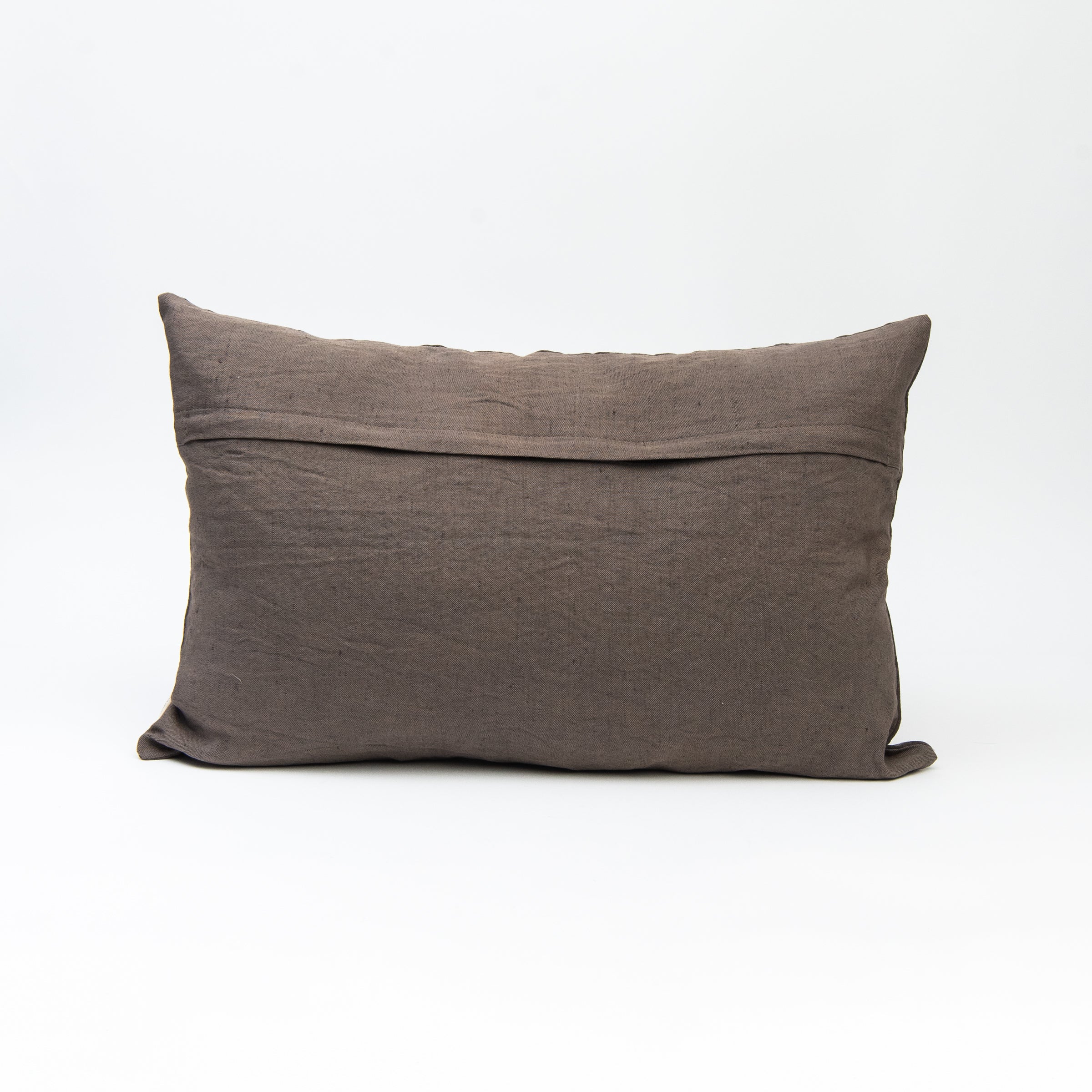 Back of Orchard Pillow in Charcoal, 16"x24" on a white background at Addison West