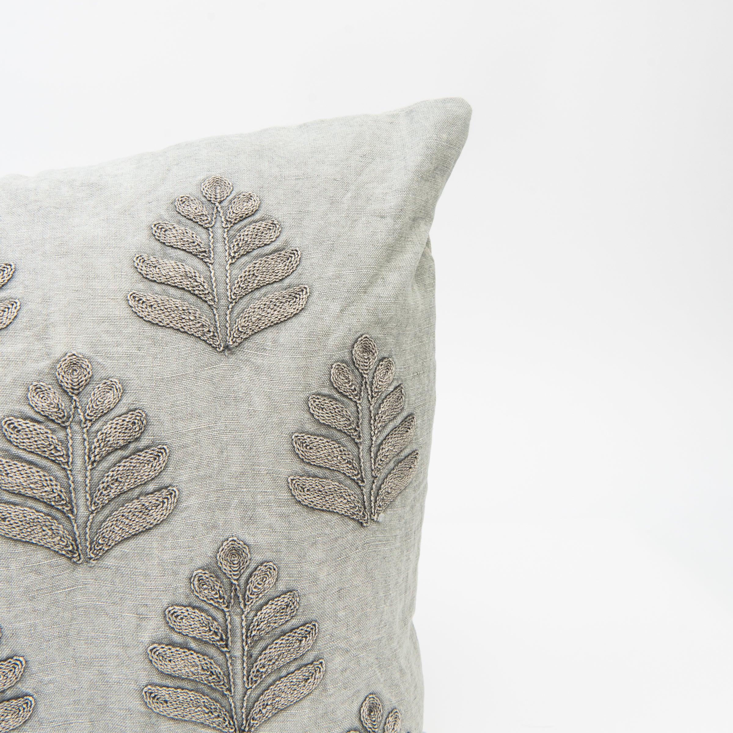 Close up of Orchard Pillow in Fog, 16"x24" on a white background at Addison West