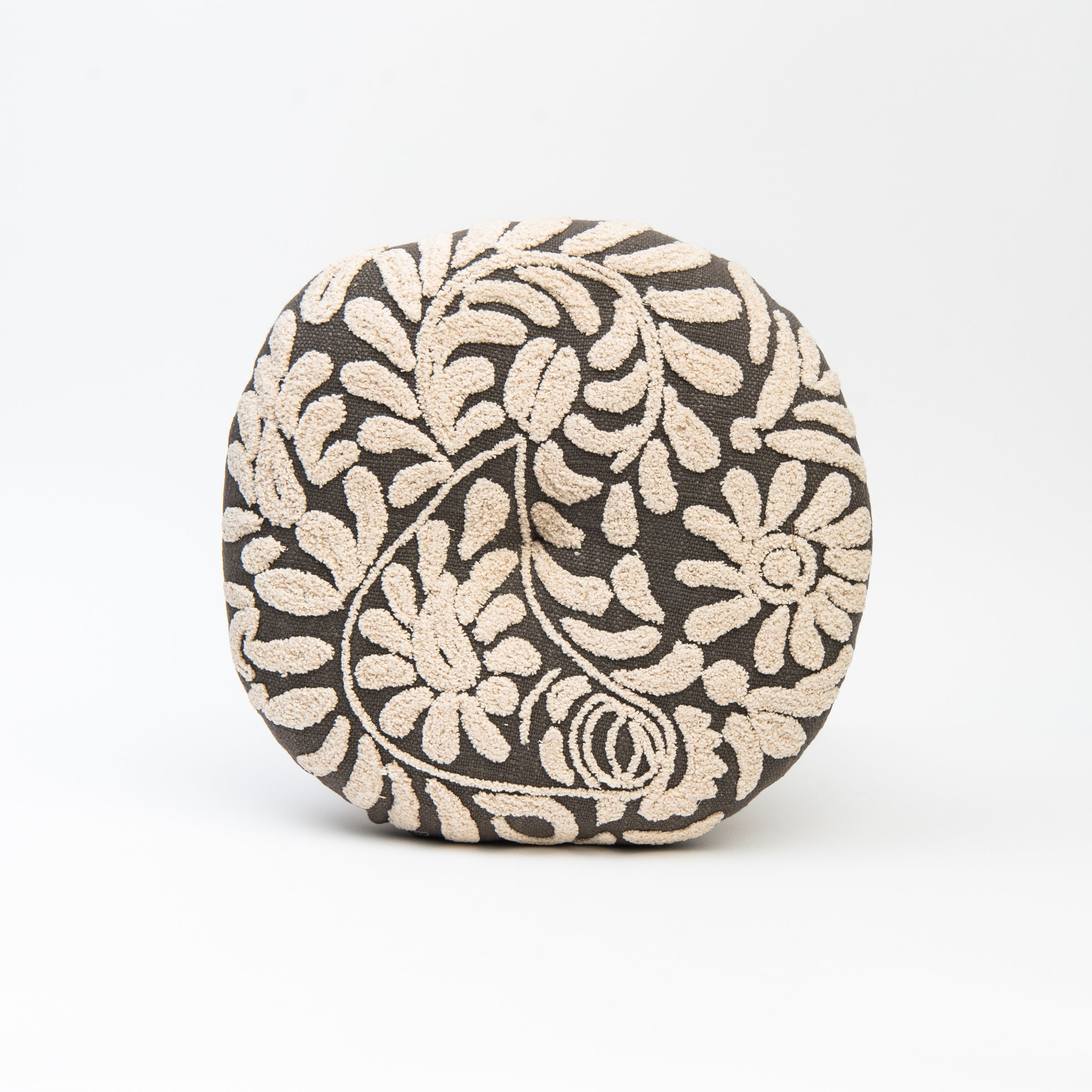 Wildflower Round Pillow in Charcoal on a white background at Addison West