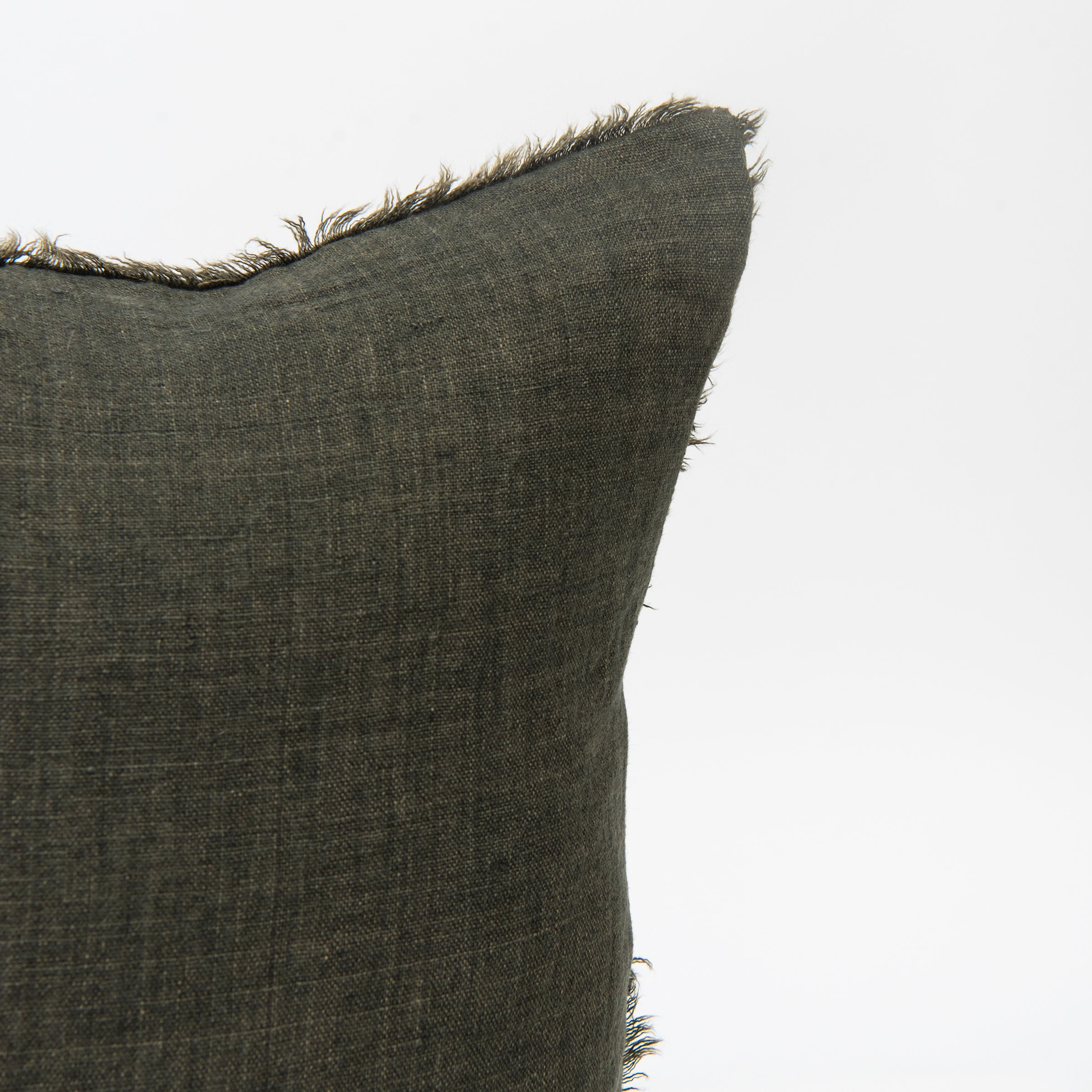 Close up of Lina Linen 20" Square Pillow in Avocado on a white background at Addison West