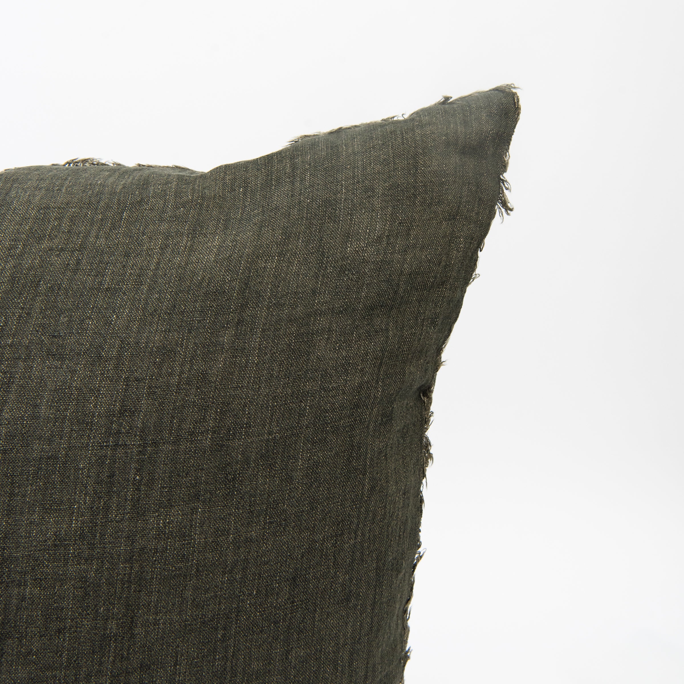 Close up of Lina Linen 24" Square Pillow in Avocado on a white background at Addison West
