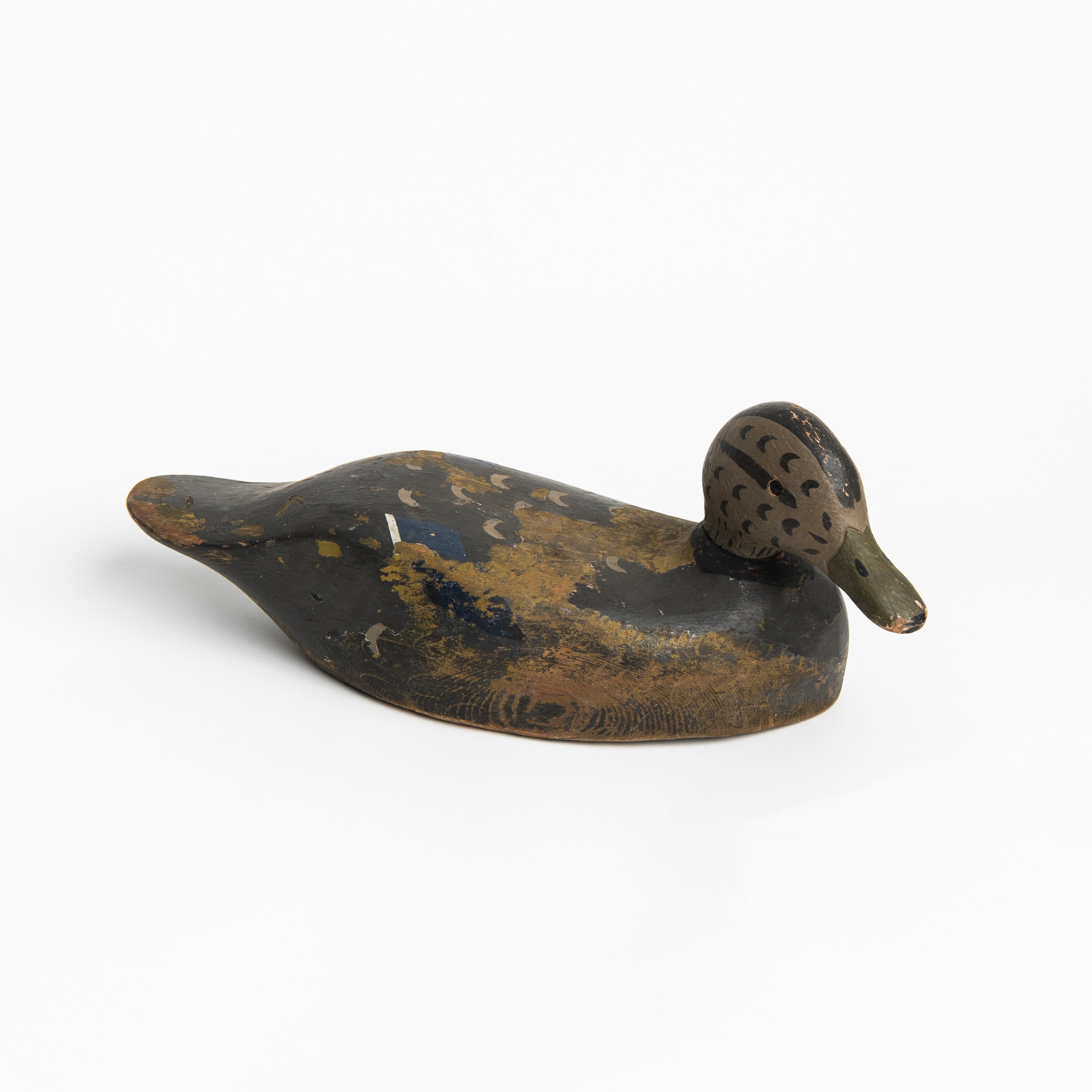 Vintage Wood Decoy on a white background at Addison West