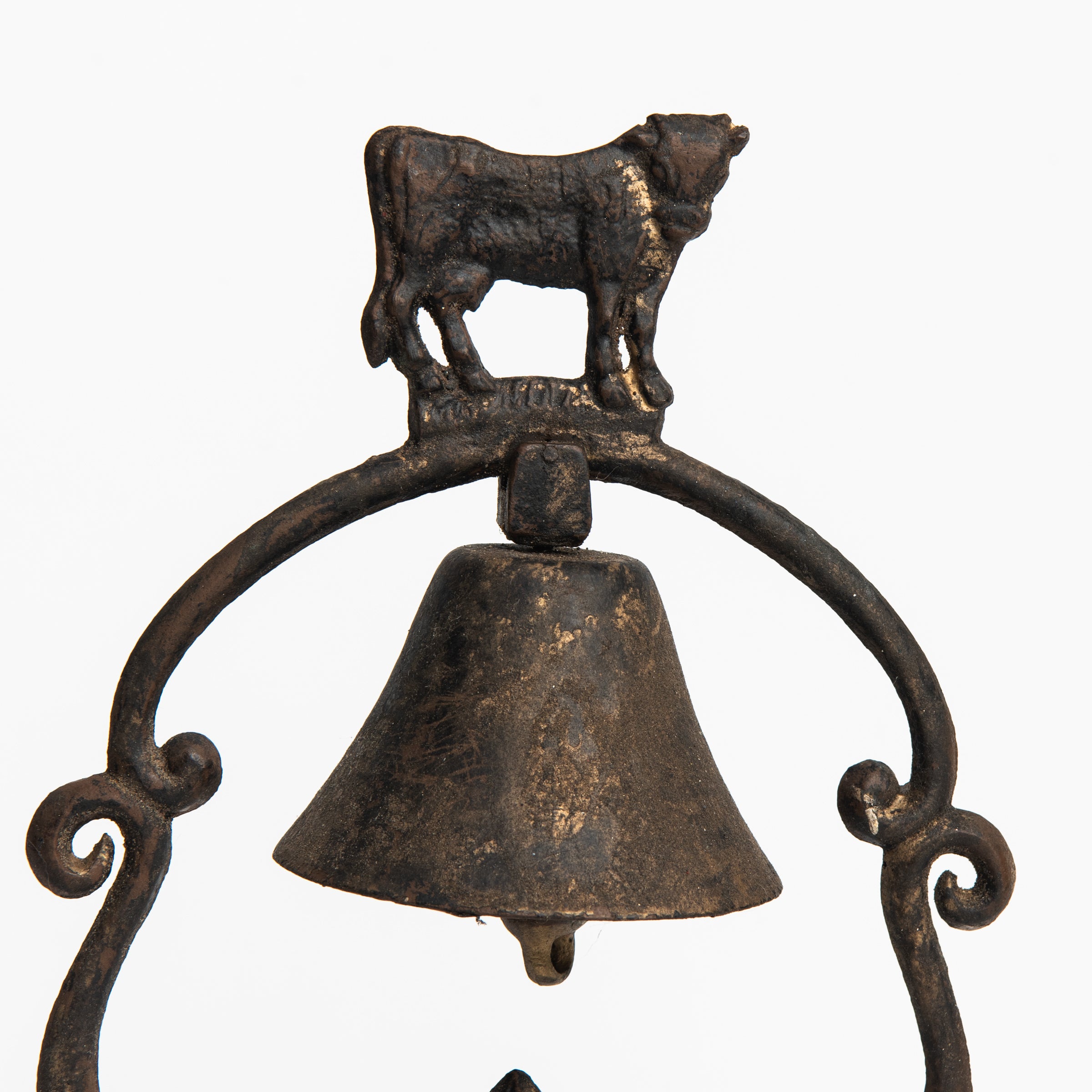 Vintage Cowbell on a white background at Addison West