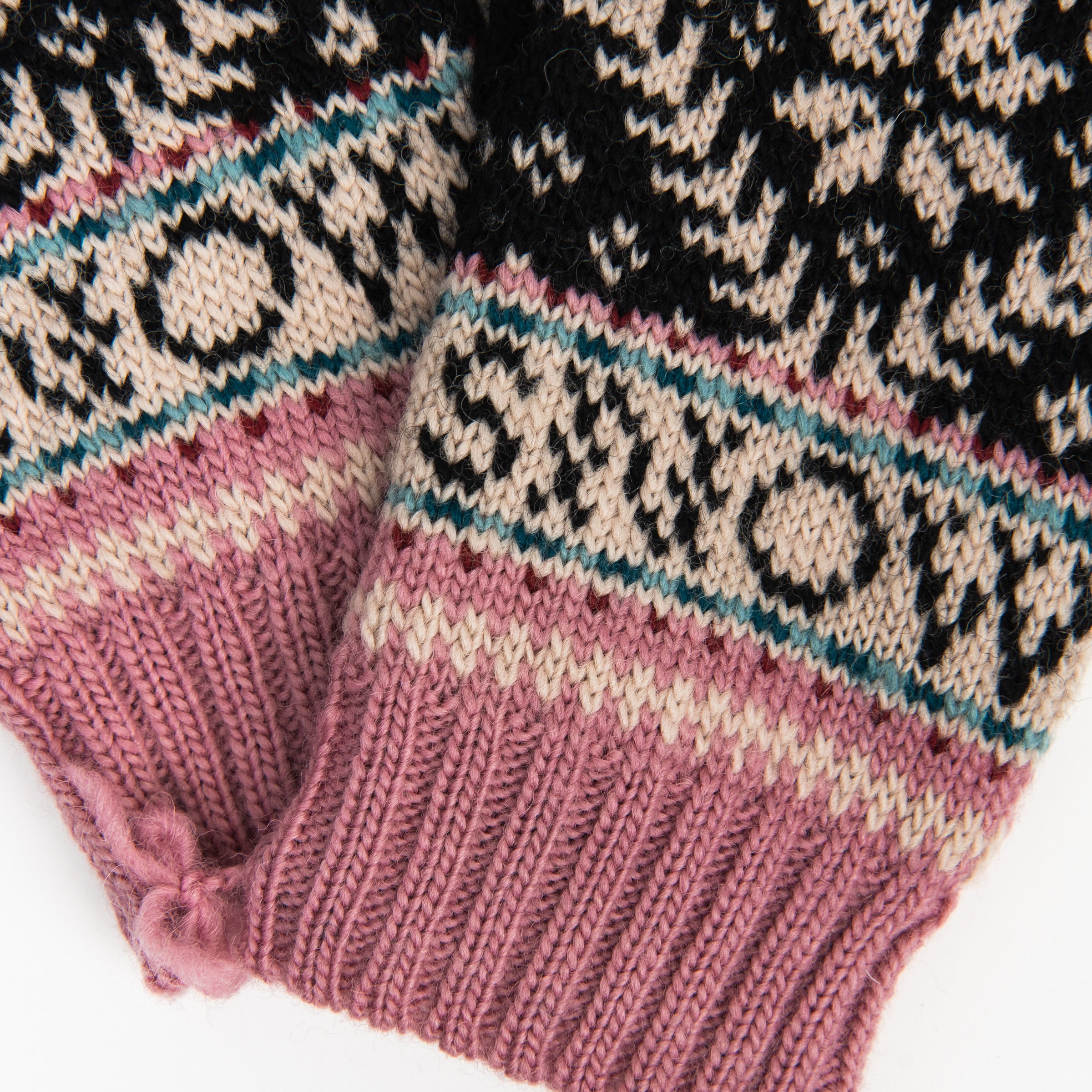Novelty Nordic Mitten in Black & Pink on a white background at Addison West