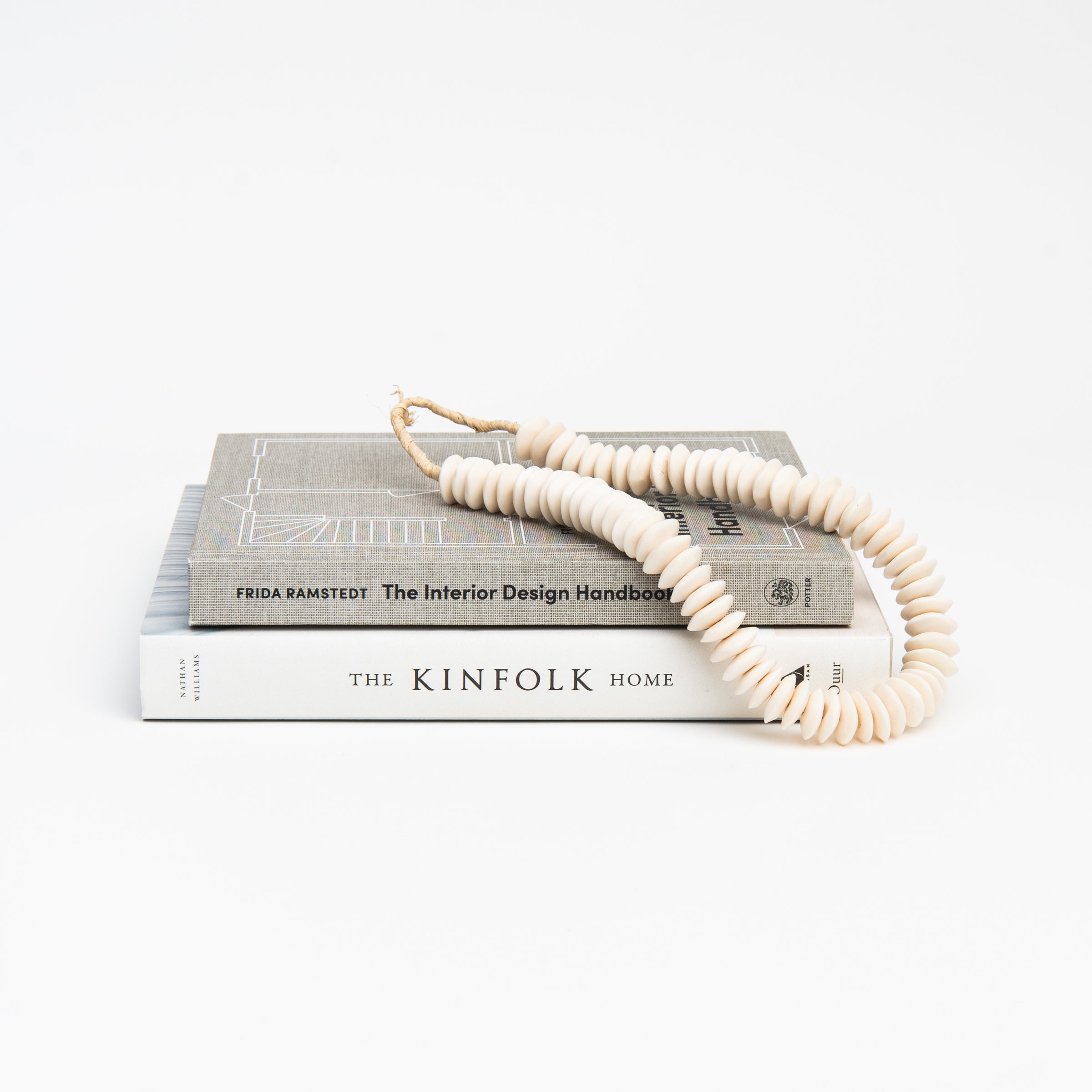 Saucer White Bone Beads on a white background at Addison West