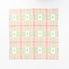 Linen Dinner Napkins in Xmas Plaid on a white table at Addison West