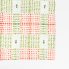 Linen Dinner Napkins in Xmas Plaid on a white table at Addison West