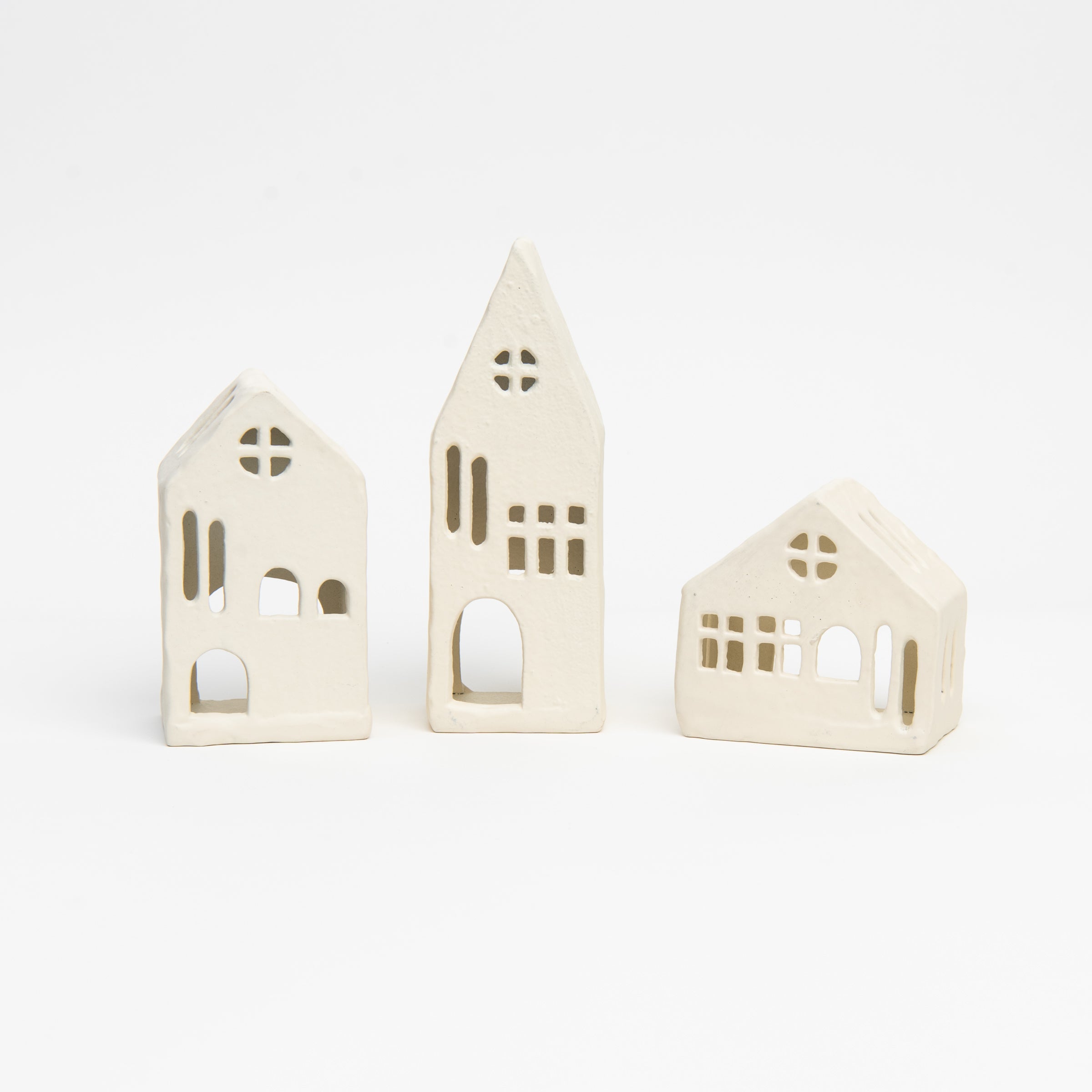 Aspen Tealight House on a white background at Addison West