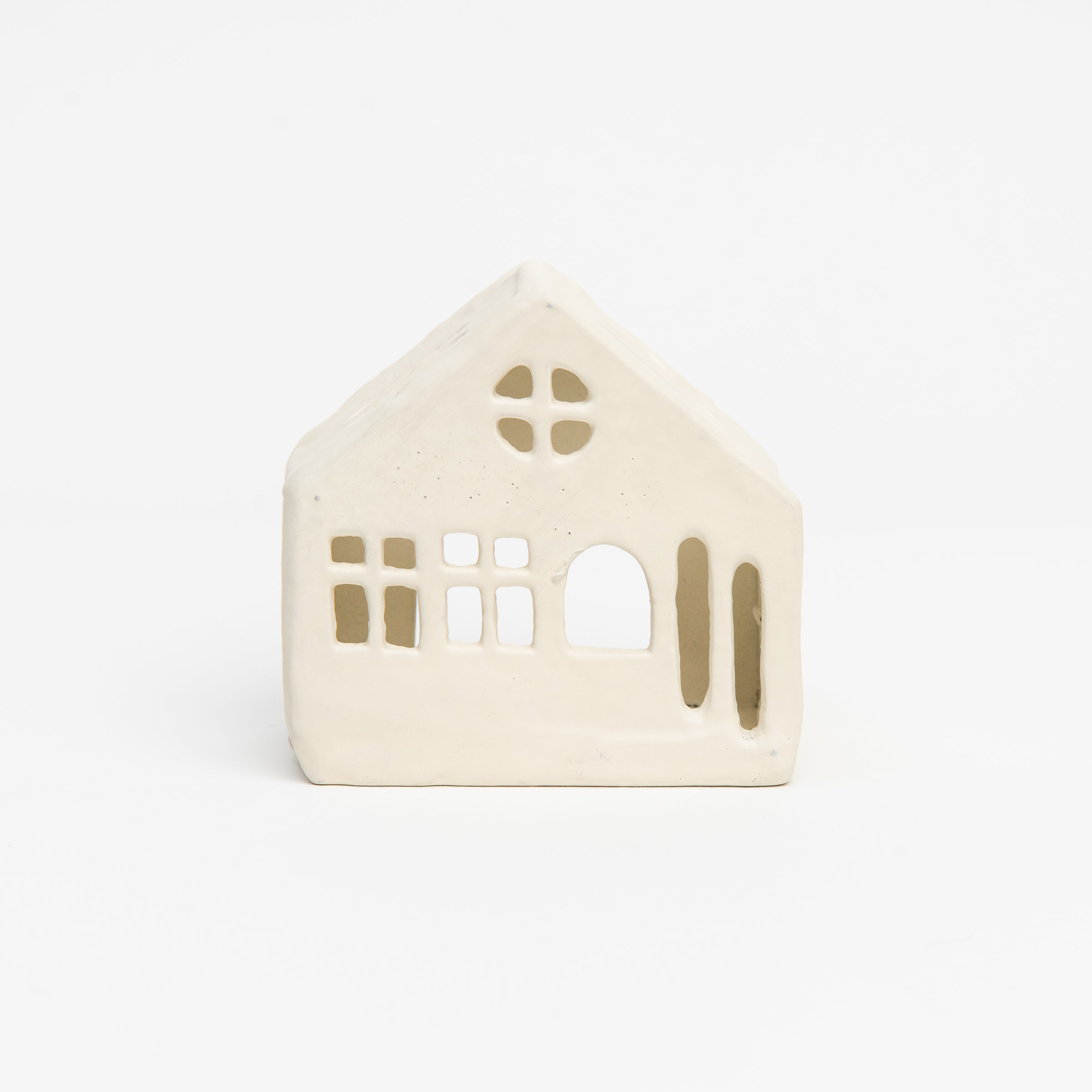 Aspen Tealight House on a white background at Addison West