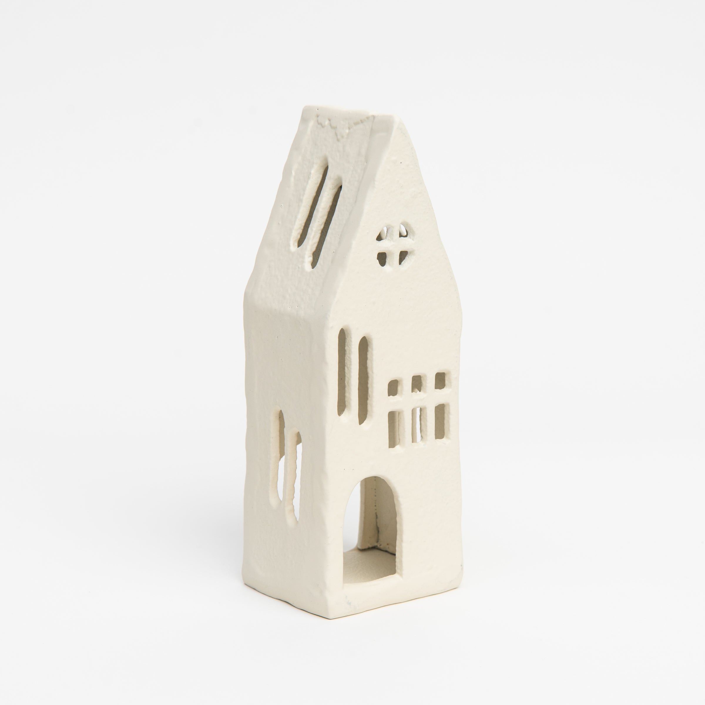 Aspen Tealight House on a white background at Addison West