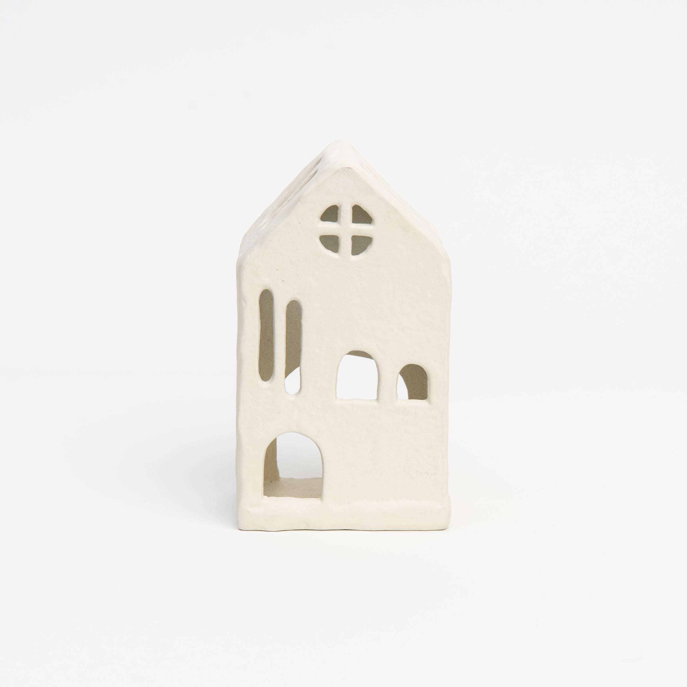 Aspen Tealight House on a white background at Addison West