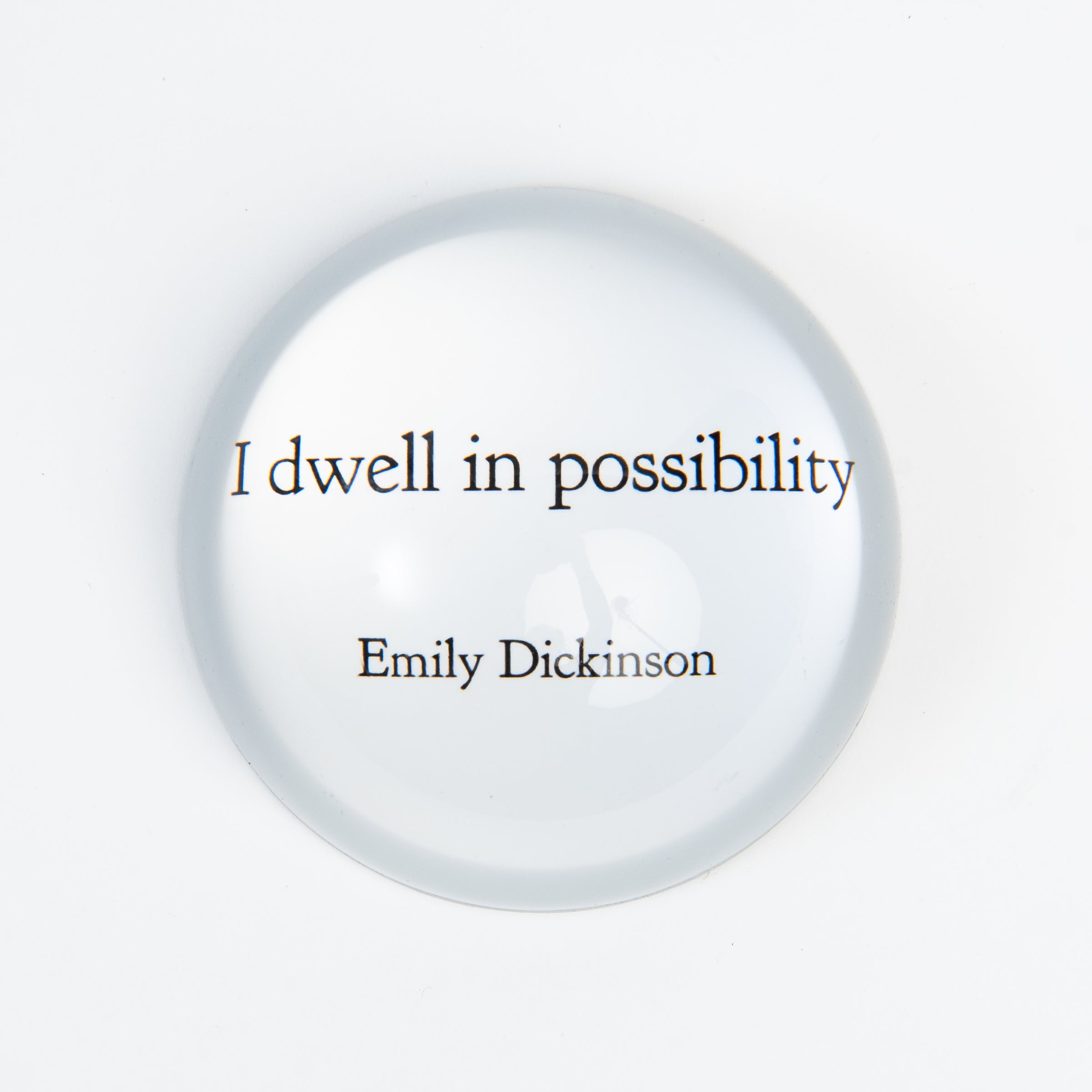 I dwell in possibility Emily Dickinson Paperweight on a white background at Addison West