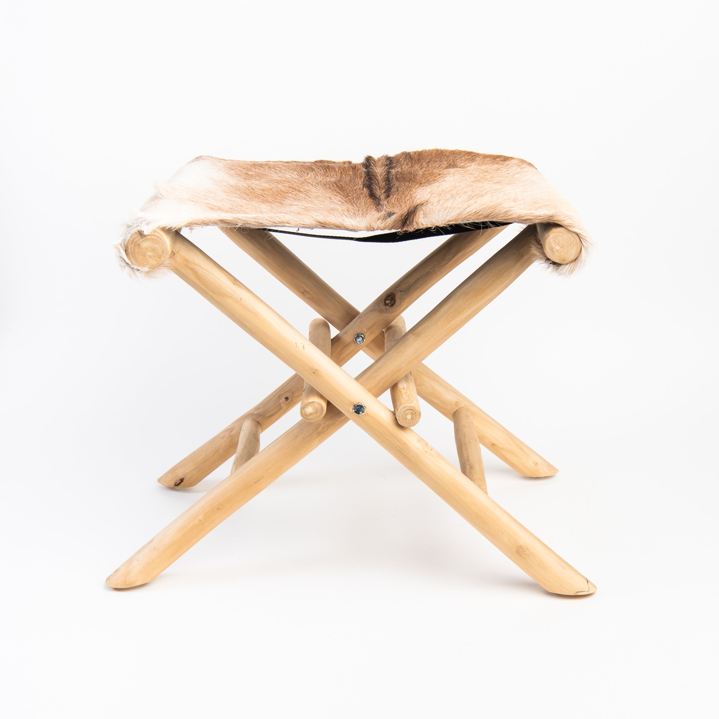 Teakwood and Goat Fur Folding Stool on a white background at Addison West