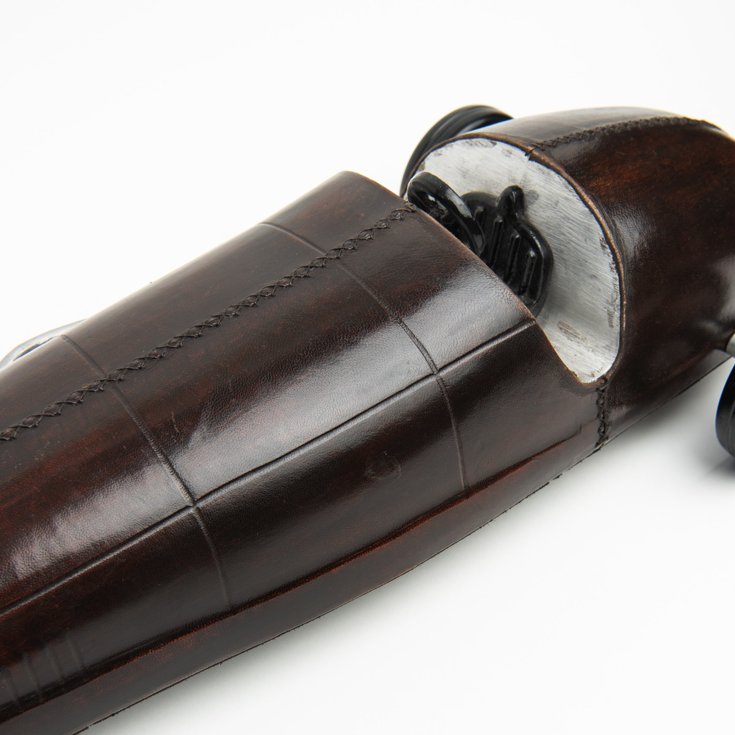 Leather Vintage Race Car on a white background at Addison West