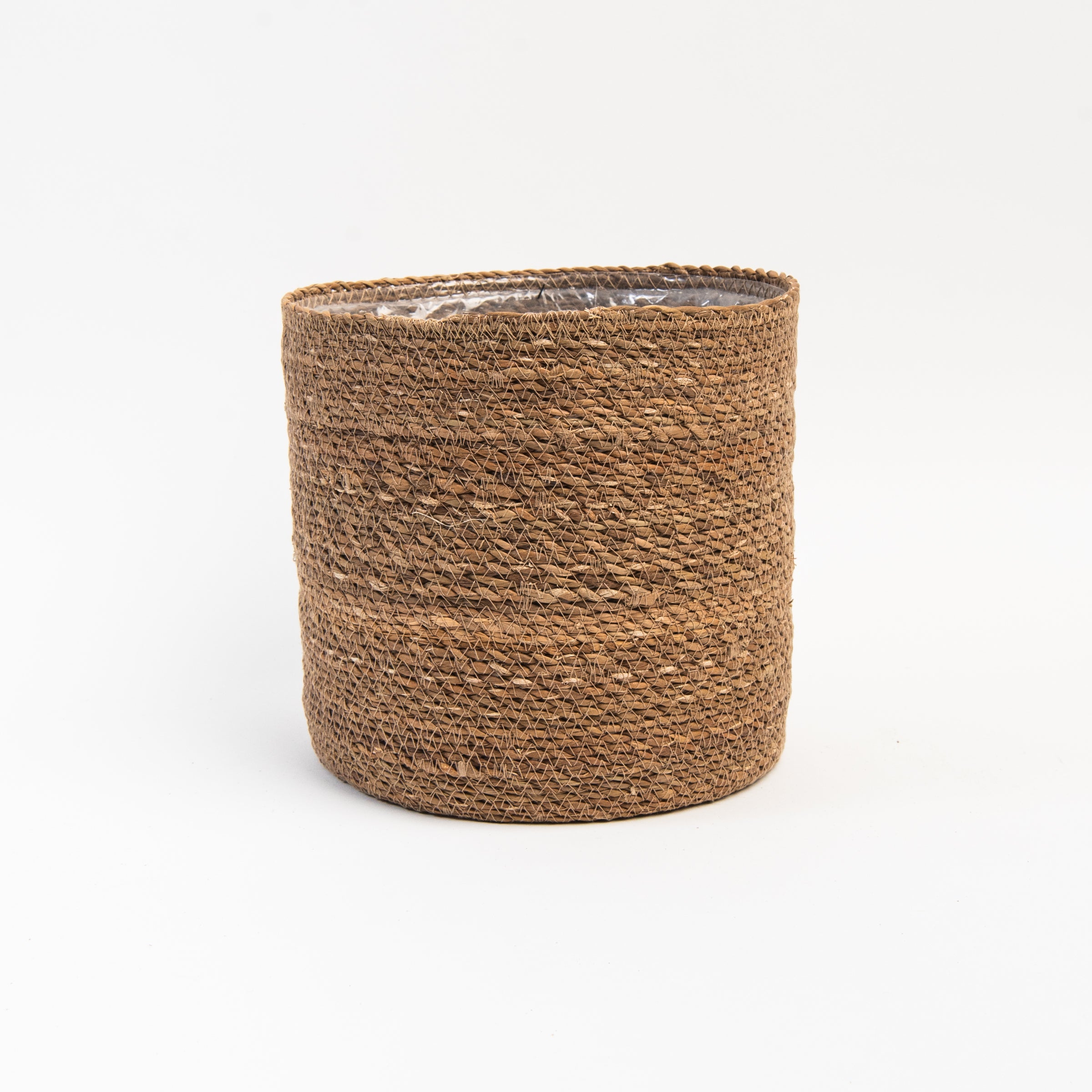 Hand-Woven Baskets with Plastic Lining on a white background at Addison West