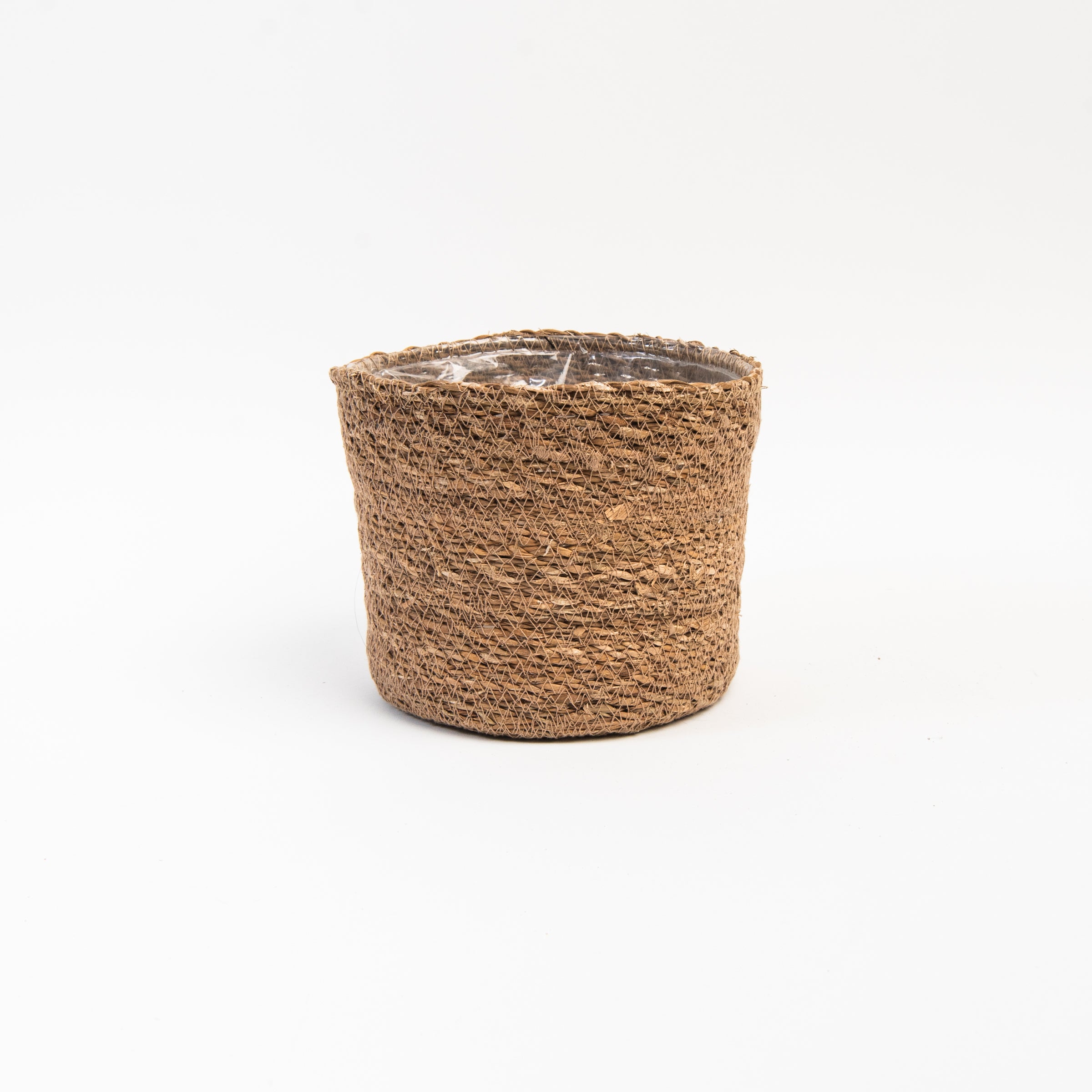 Hand-Woven Baskets with Plastic Lining on a white background at Addison West