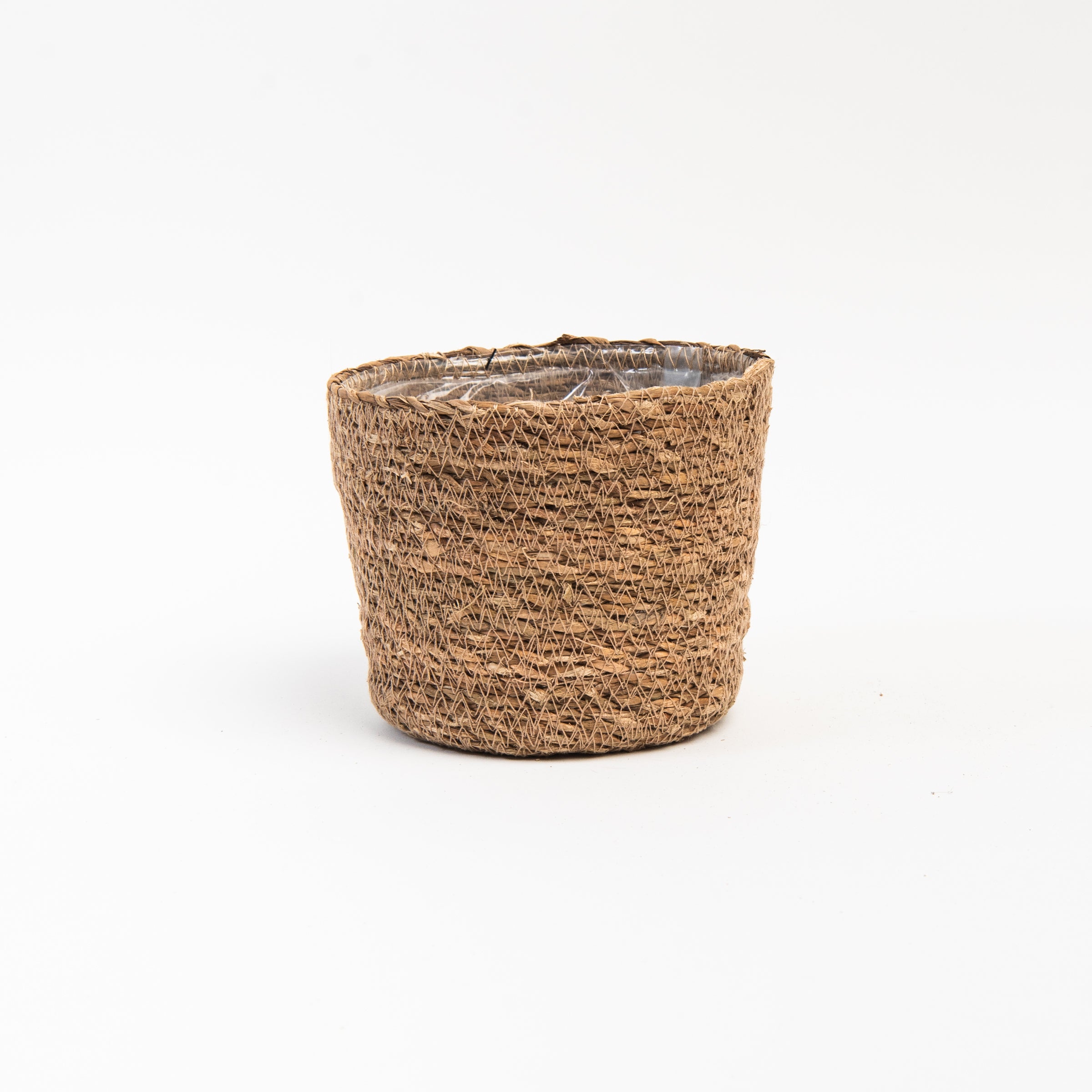 Hand-Woven Baskets with Plastic Lining on a white background at Addison West