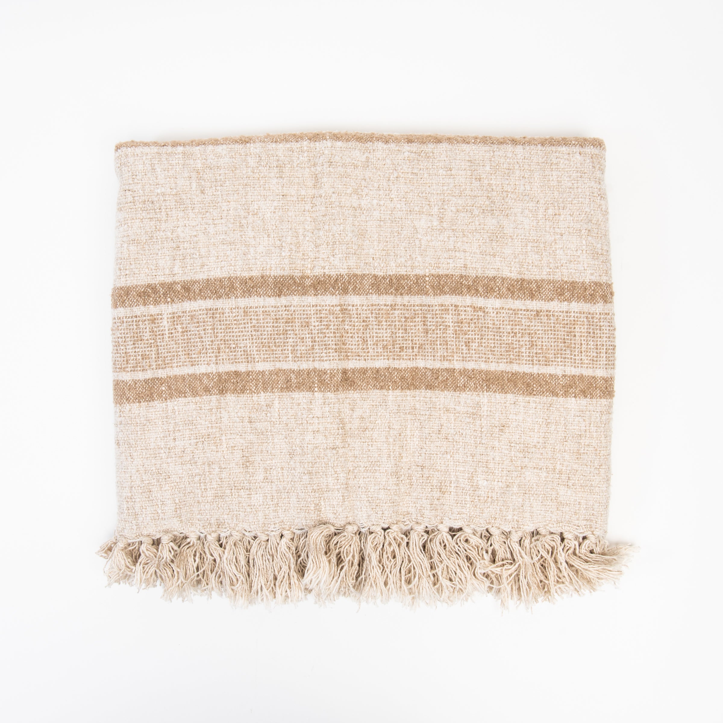 Tulum Striped Throw in Clay on a white background at Addison West