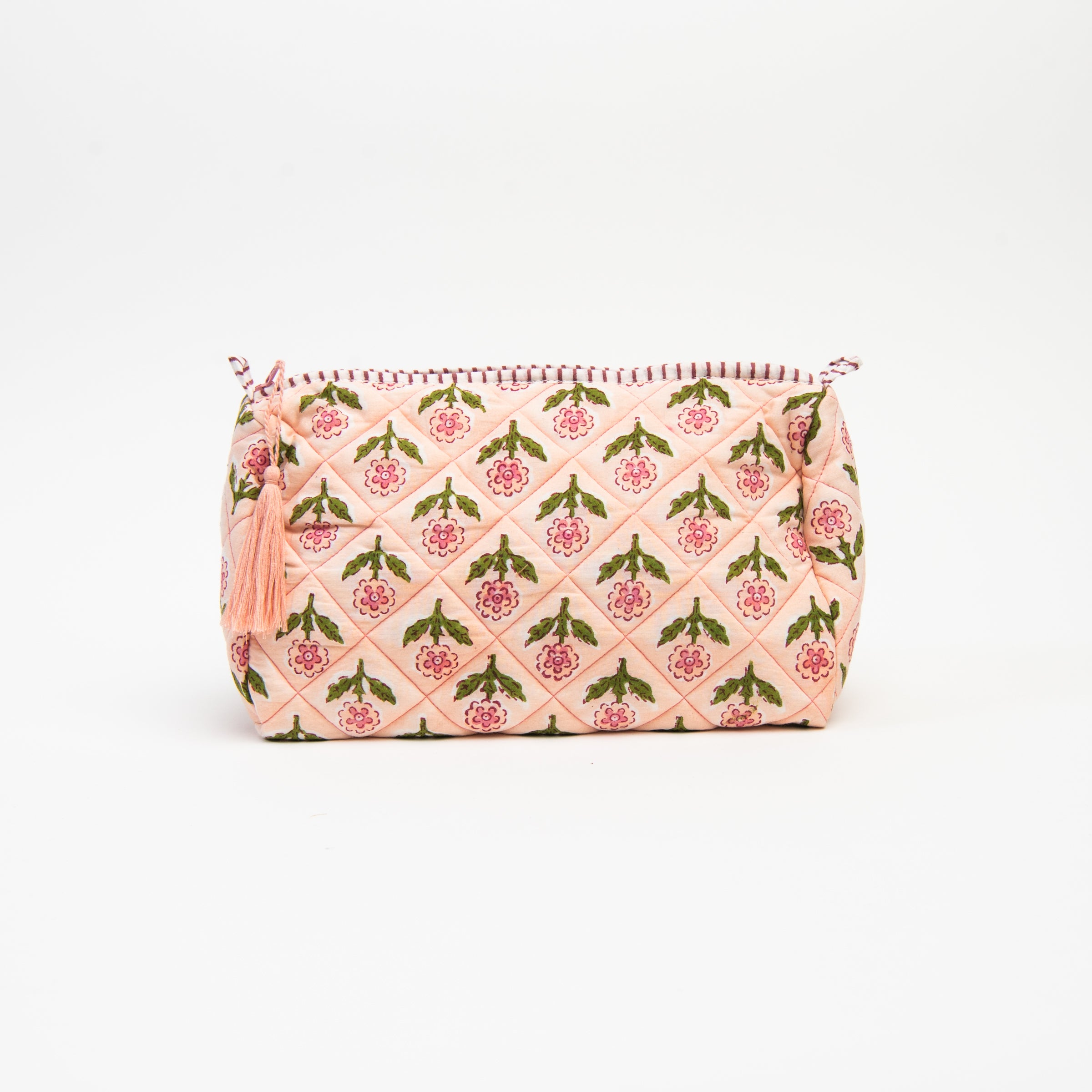 LargeMona Print Toiletry Bag in Pink on a white background at Addison West