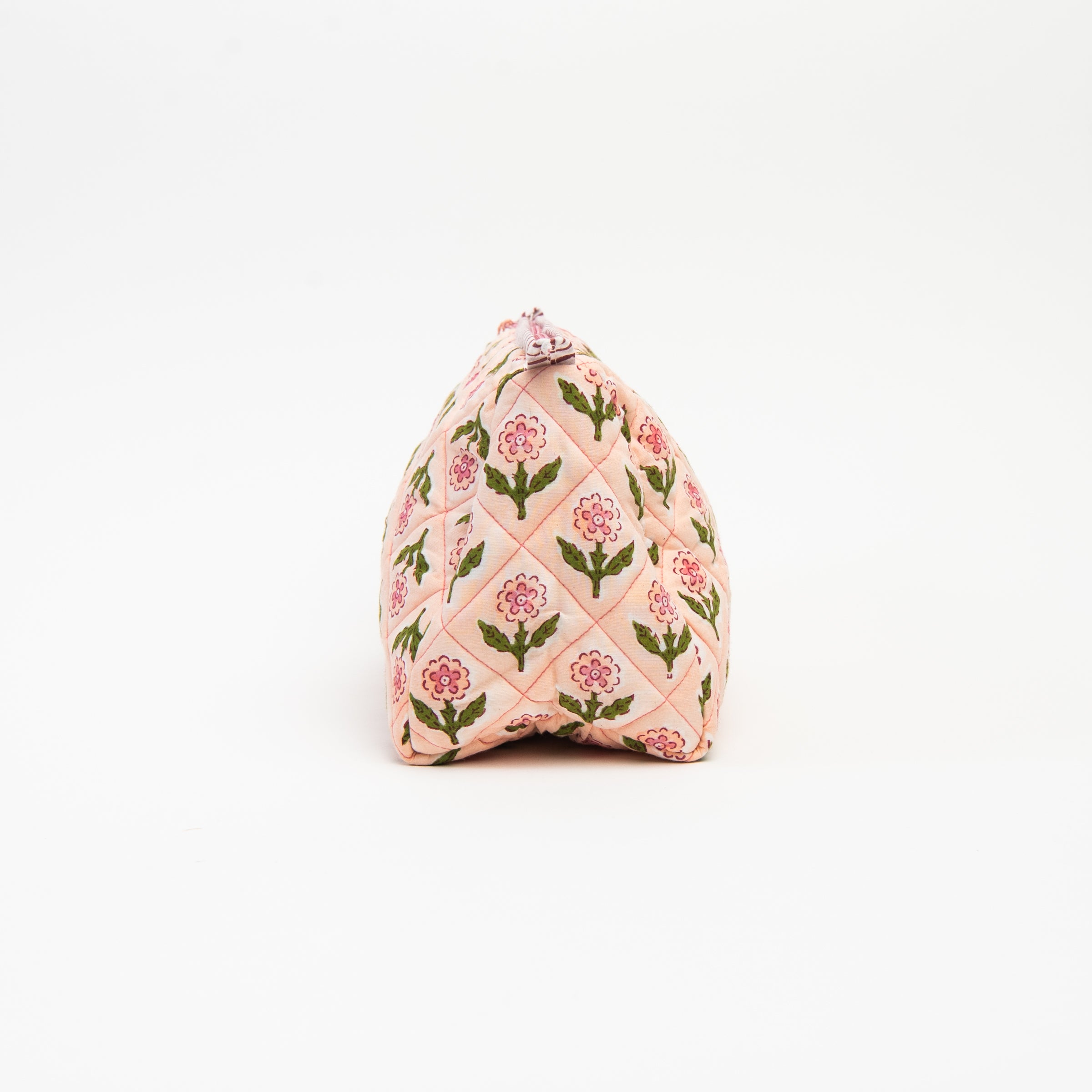 Side of Mona Print Toiletry Bag in Pink on a white background at Addison West