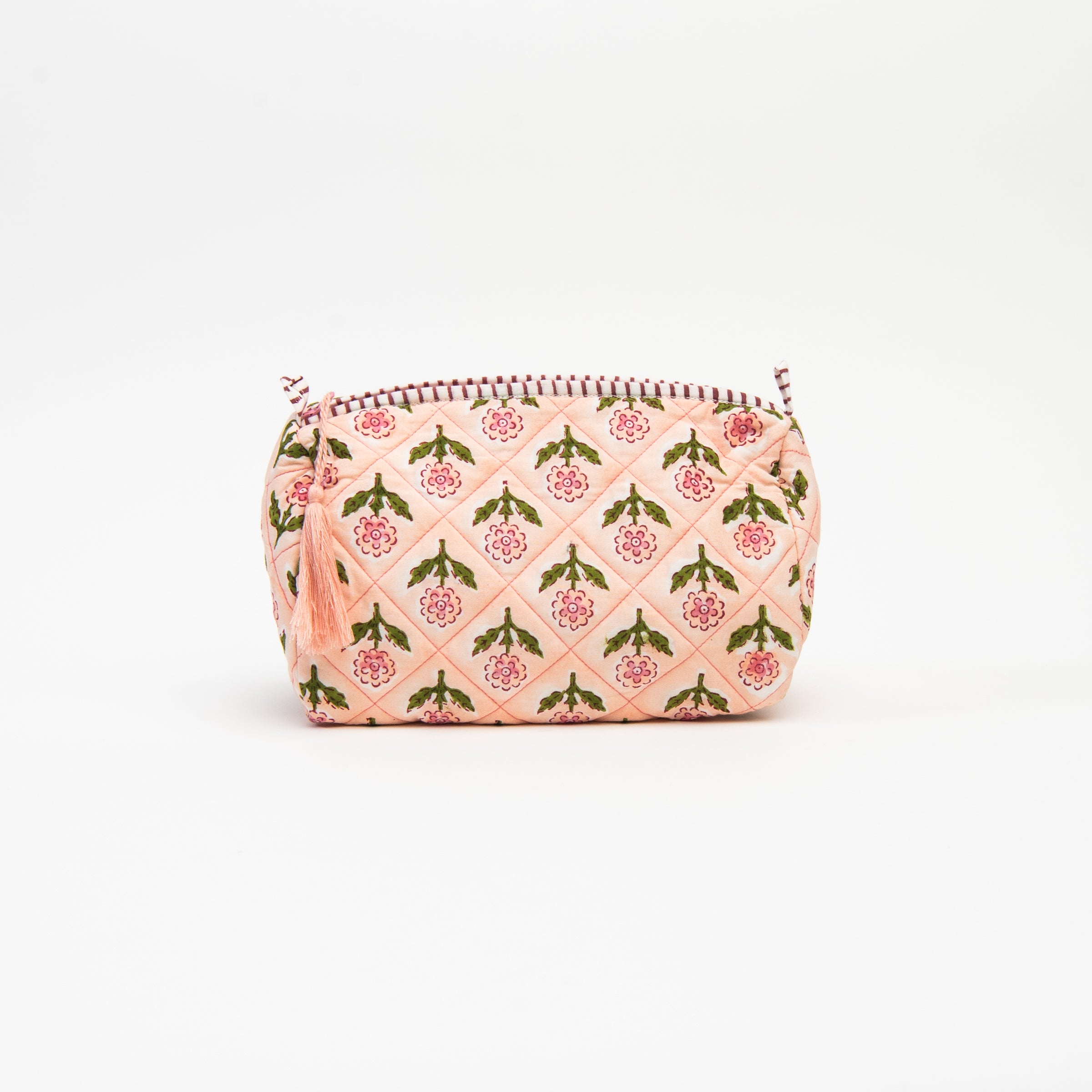Medium Mona Print Toiletry Bag in Pink on a white background at Addison West